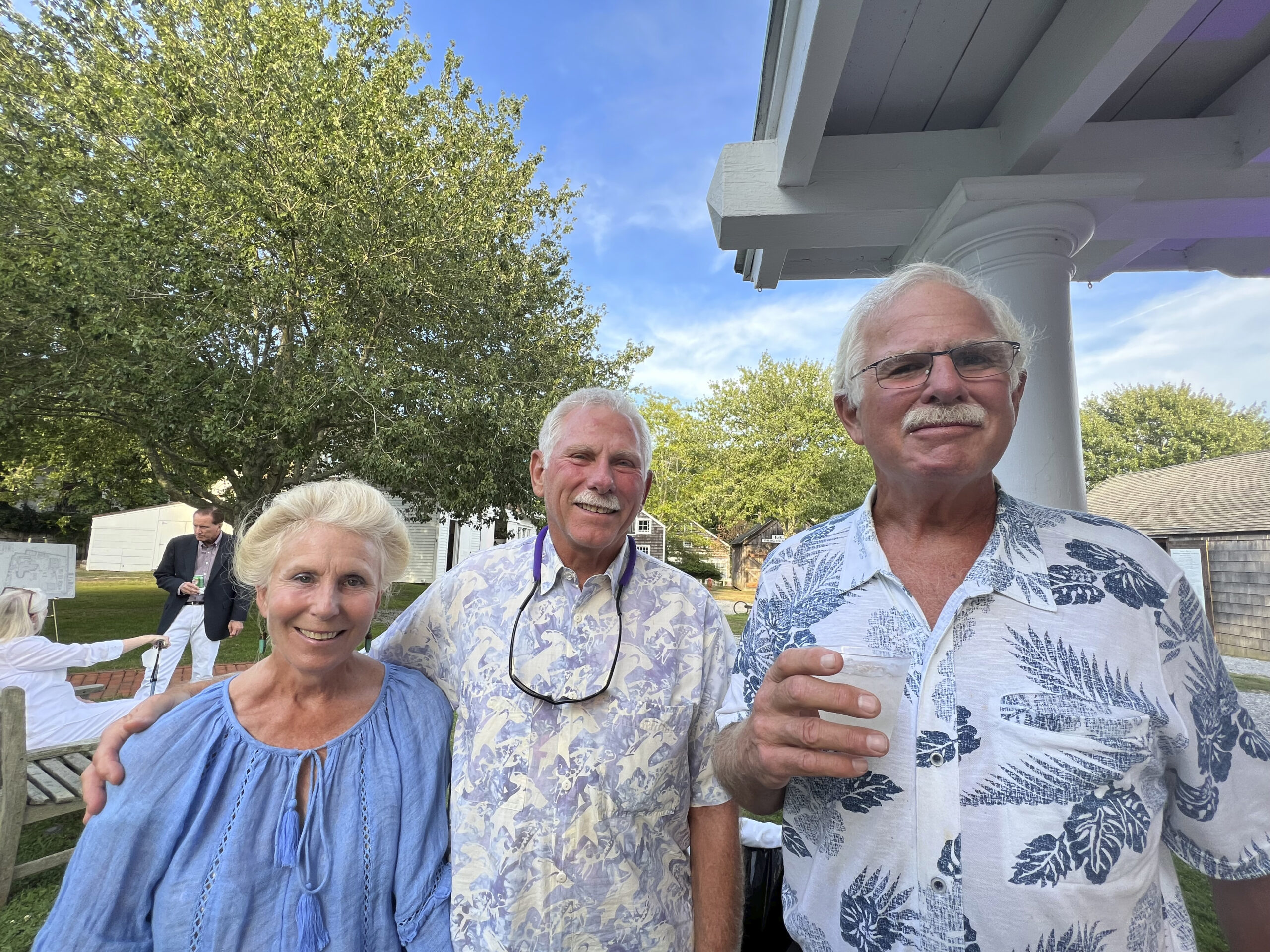 Deborah and Noel hare with Tm Corwin at the Rotary Club of Southampton's 'A Night at the Museum,' on August 25 at the Southampton History Museum.     DANA SHAW