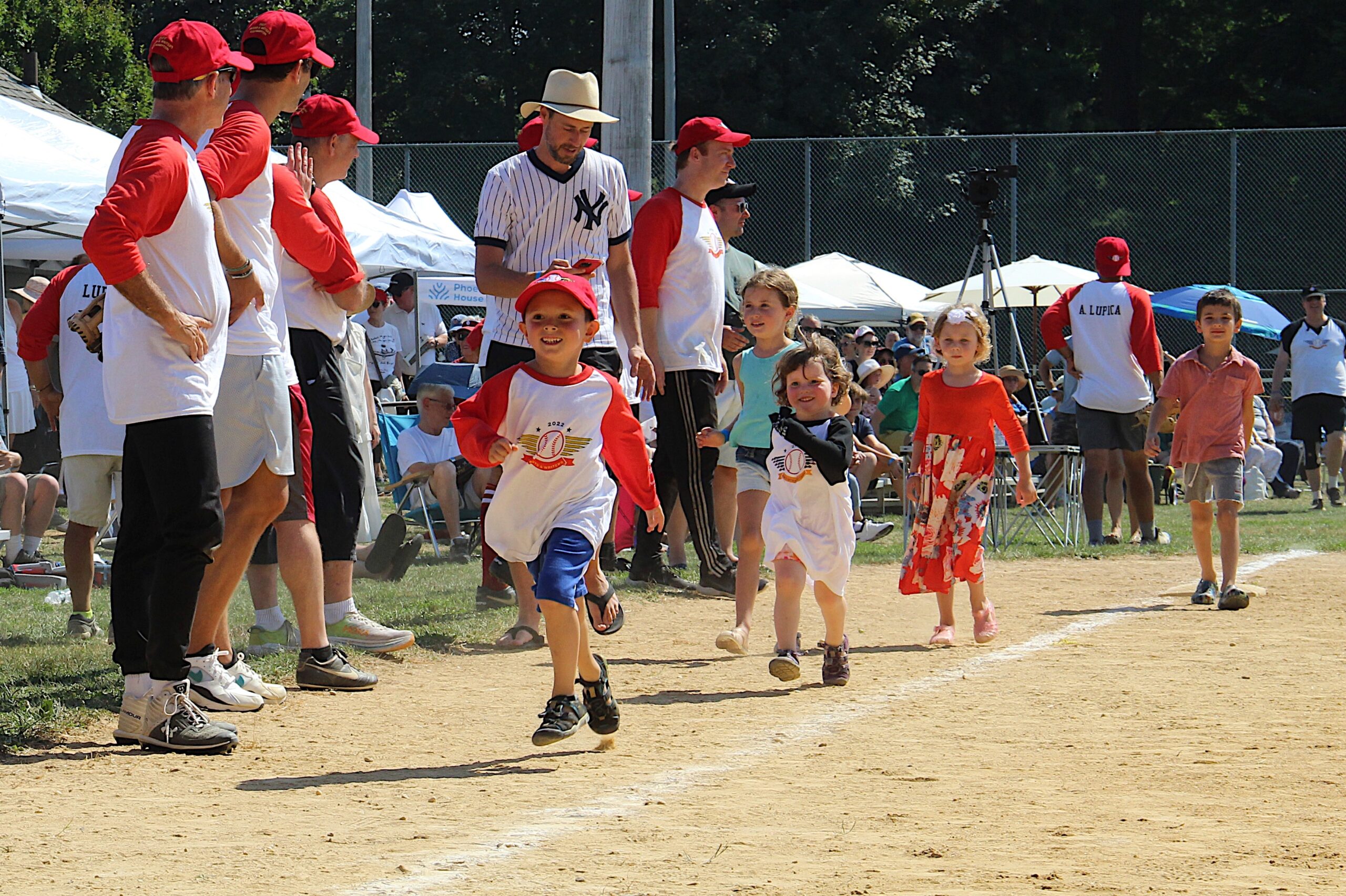 The kids run the bases.    KYRIL BROMLEY