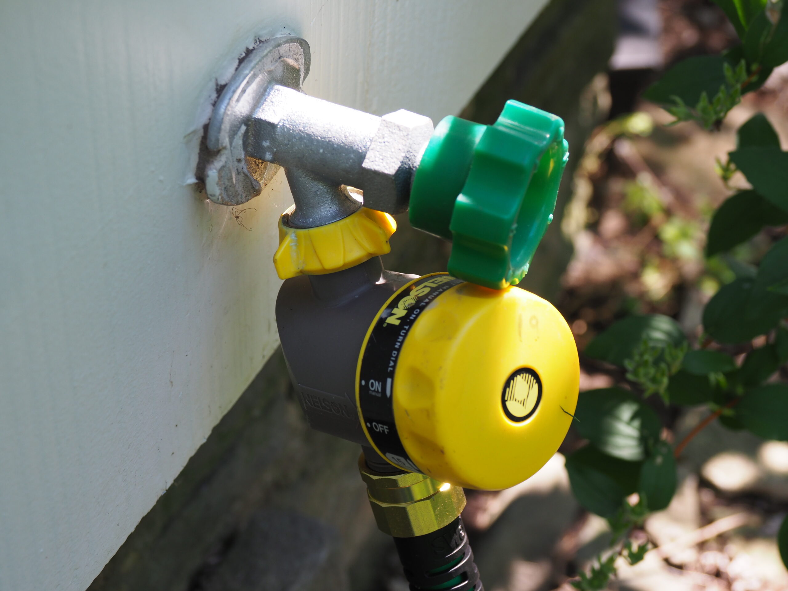 A mechanical water clock attached to a hose bib can be a time saver and can meter water based on the length of time you set It for. Make sure all the connections are tight to eliminate leaks as wasted water.  ANDREW MESSINGER