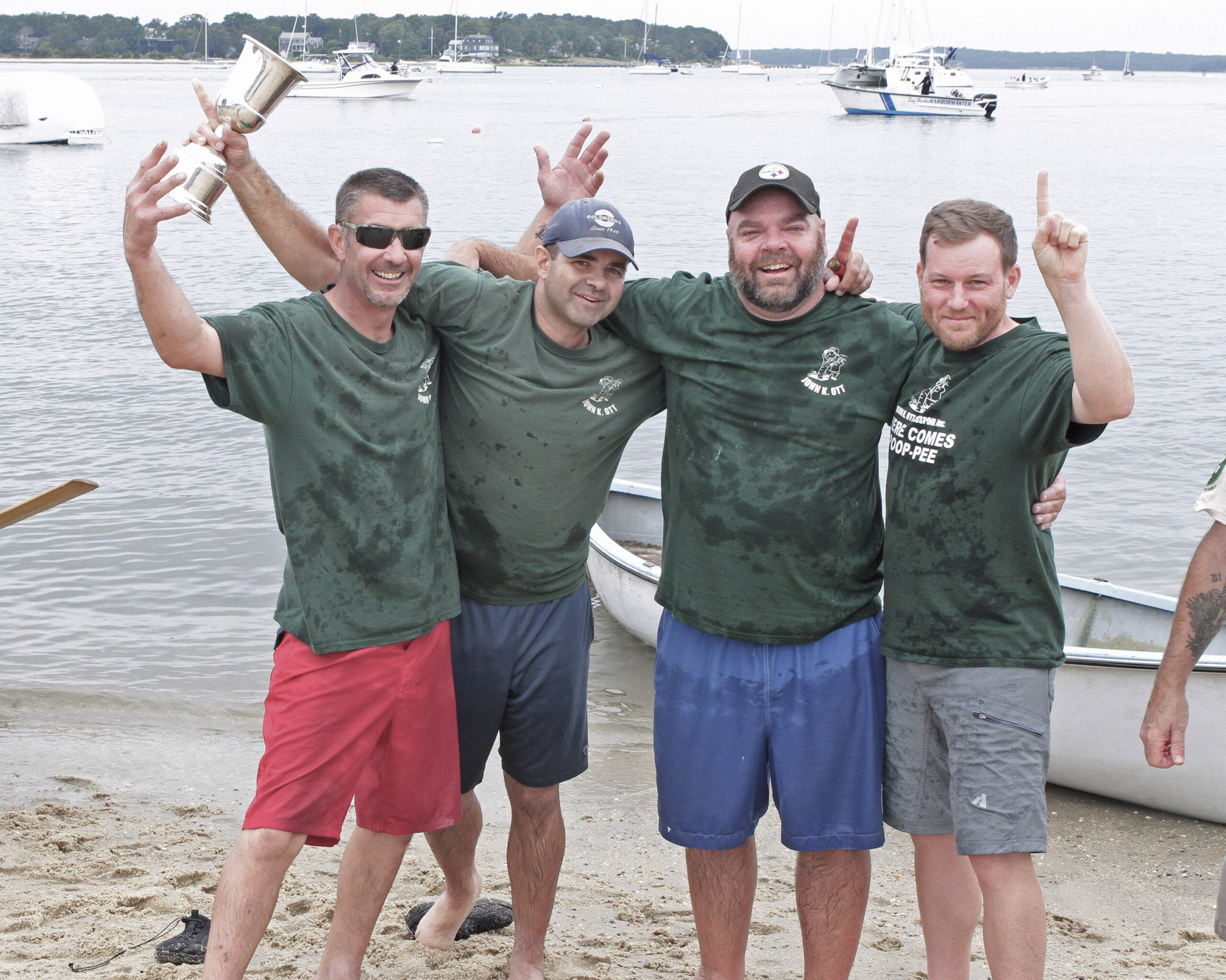 The men's Whaleboat Champions. The John K. Ott team: David Schroeder, Gene Garypie, Mike Daniels and John Cottrell.