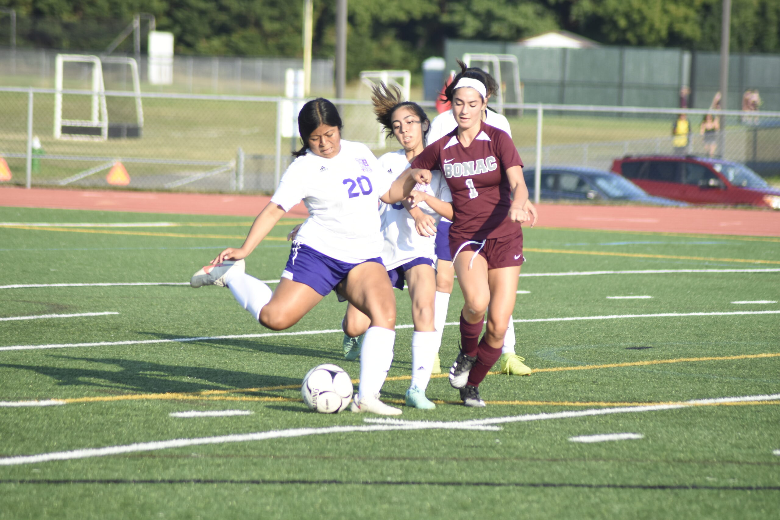 Hampton Bays junior Lexie Ramos clears the ball.   DREW BUDD