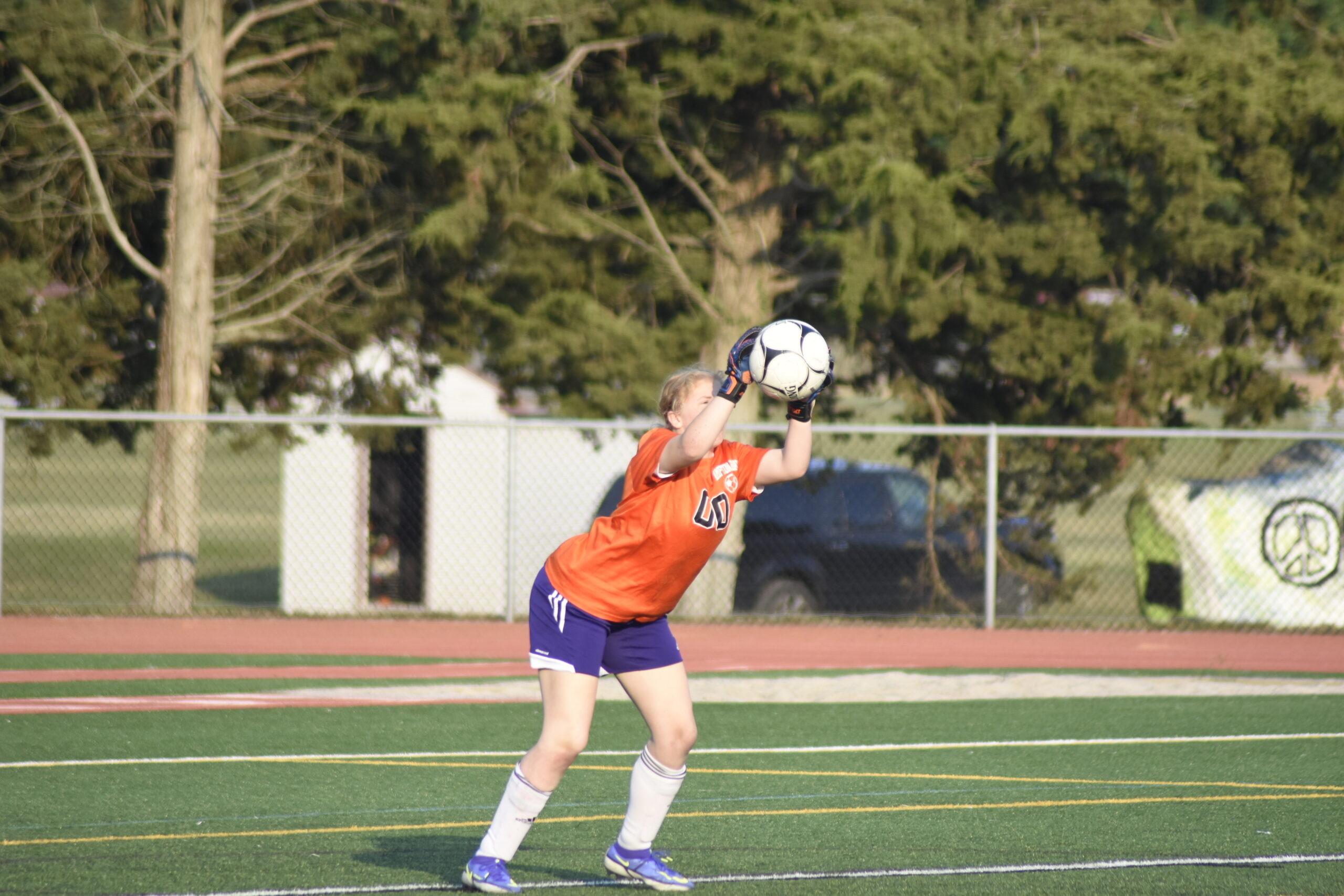 Hampton Bays freshman Brianna Farrell makes one of her 22 saves.    DREW BUDD