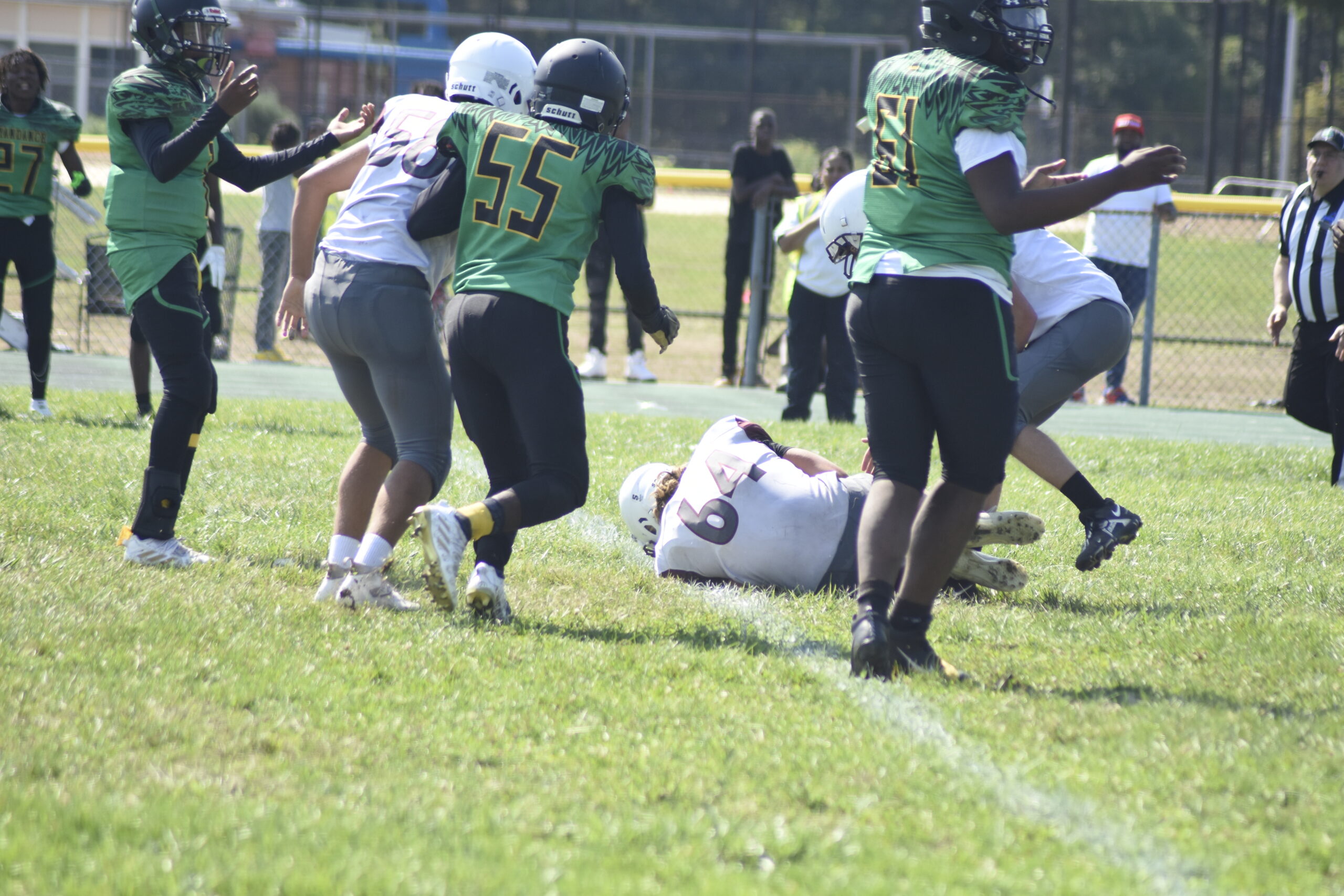 Richie Maio pounces on a loose ball for a fumble recovery.    DREW BUDD