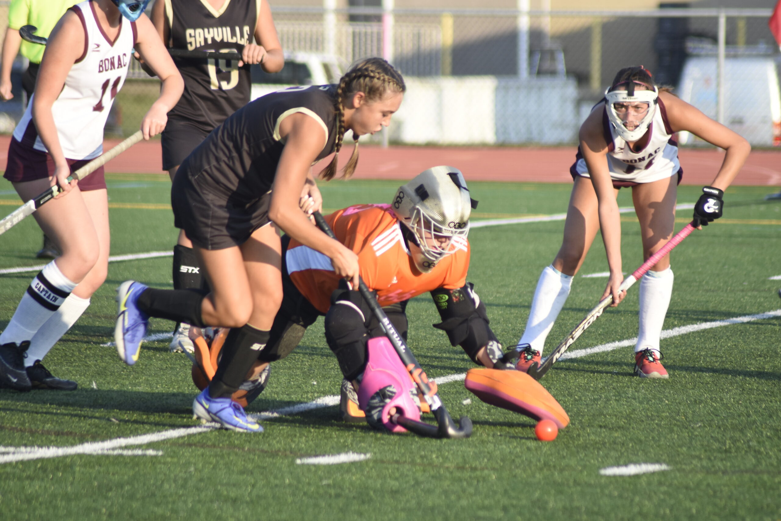 East Hampton freshman goalie Caeleigh Schuster makes a save.    DREW BUDD