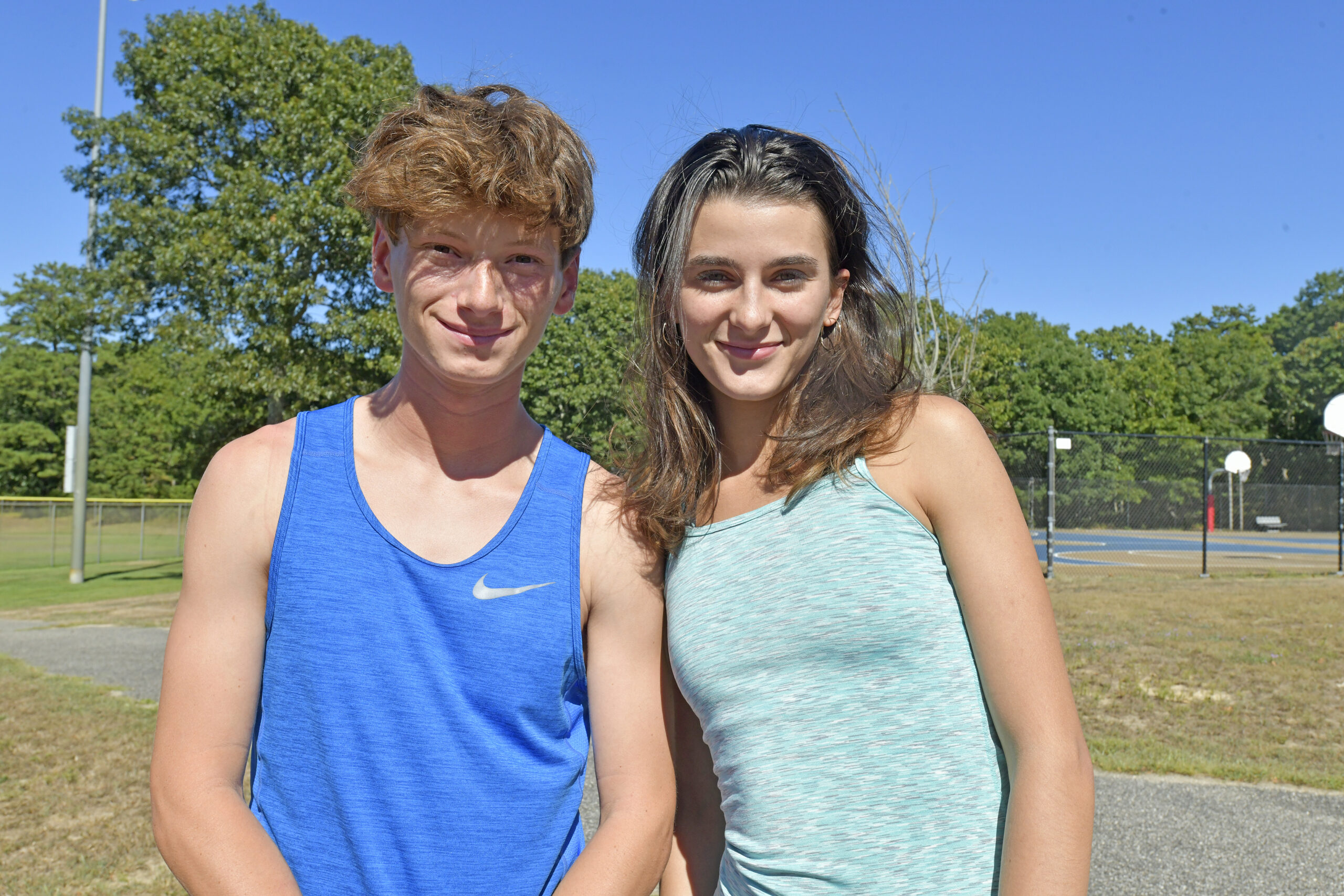 Westhampton Beach boys cross country team seniors Max Haynia and Anabel Velloso. DANA SHAW