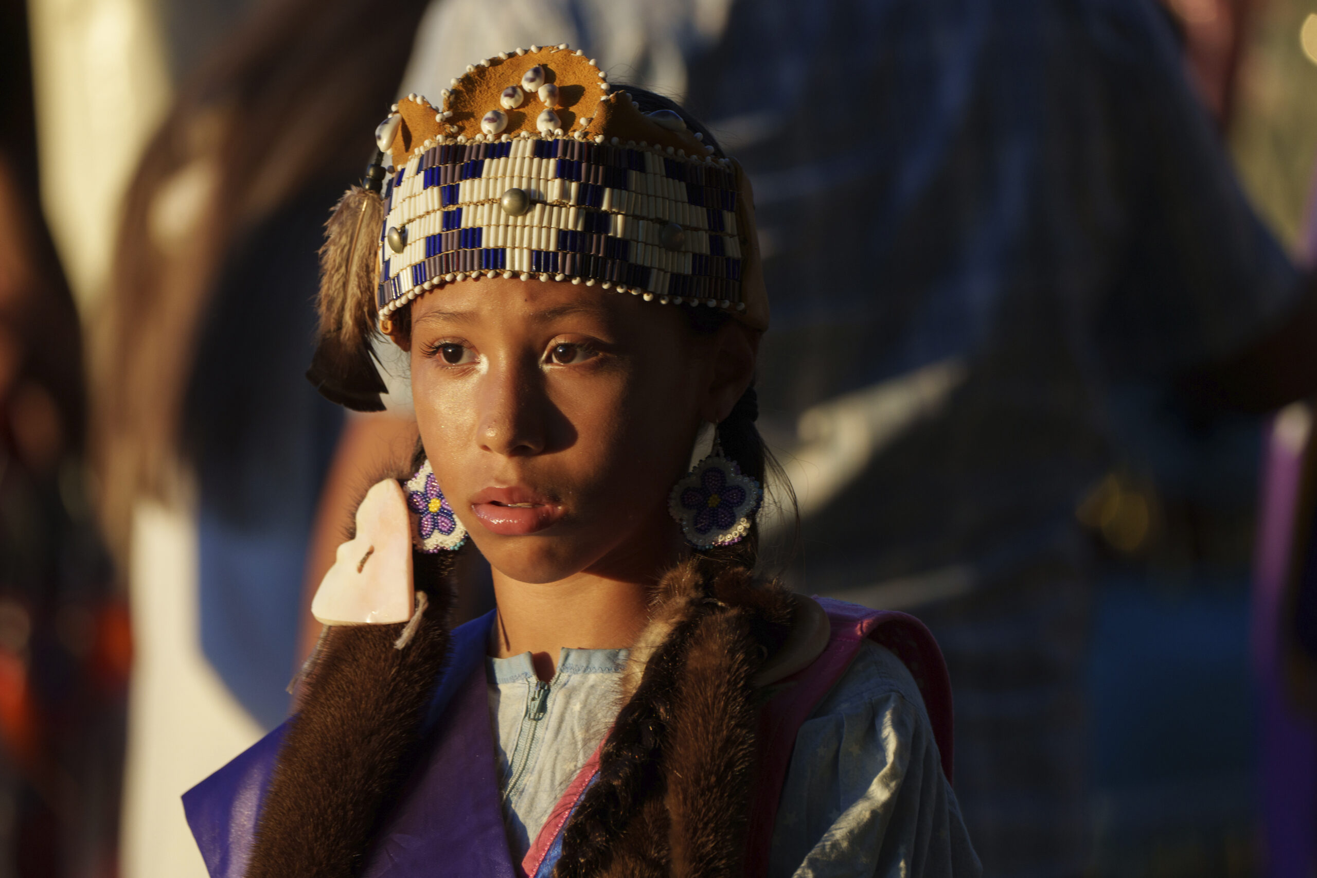 Sophia Cushing Pocknett, 12, attends the Shinnecock Powwow.