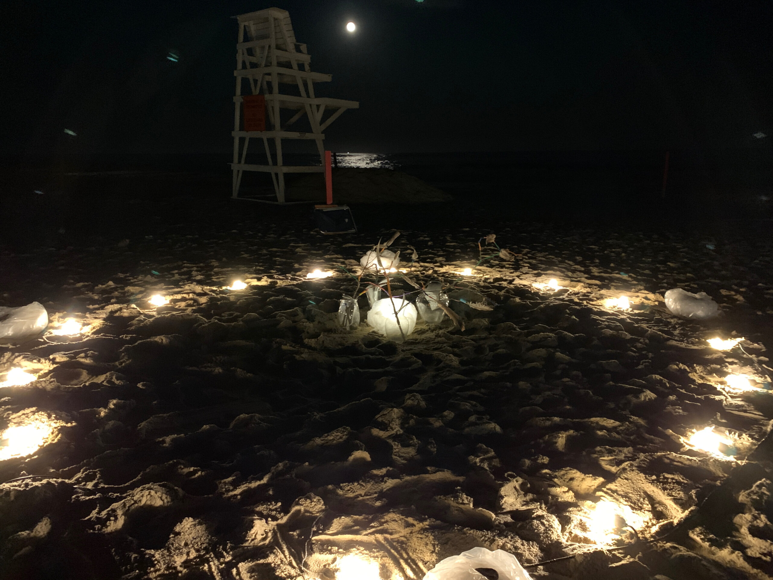 Artist Elana Bajo's art installation under the full moon at East Hampton's Main Beach on September 10 was created in response to a musical love letter from West Coast artist Jasmine Orpilla. ANNETTE HINKLE