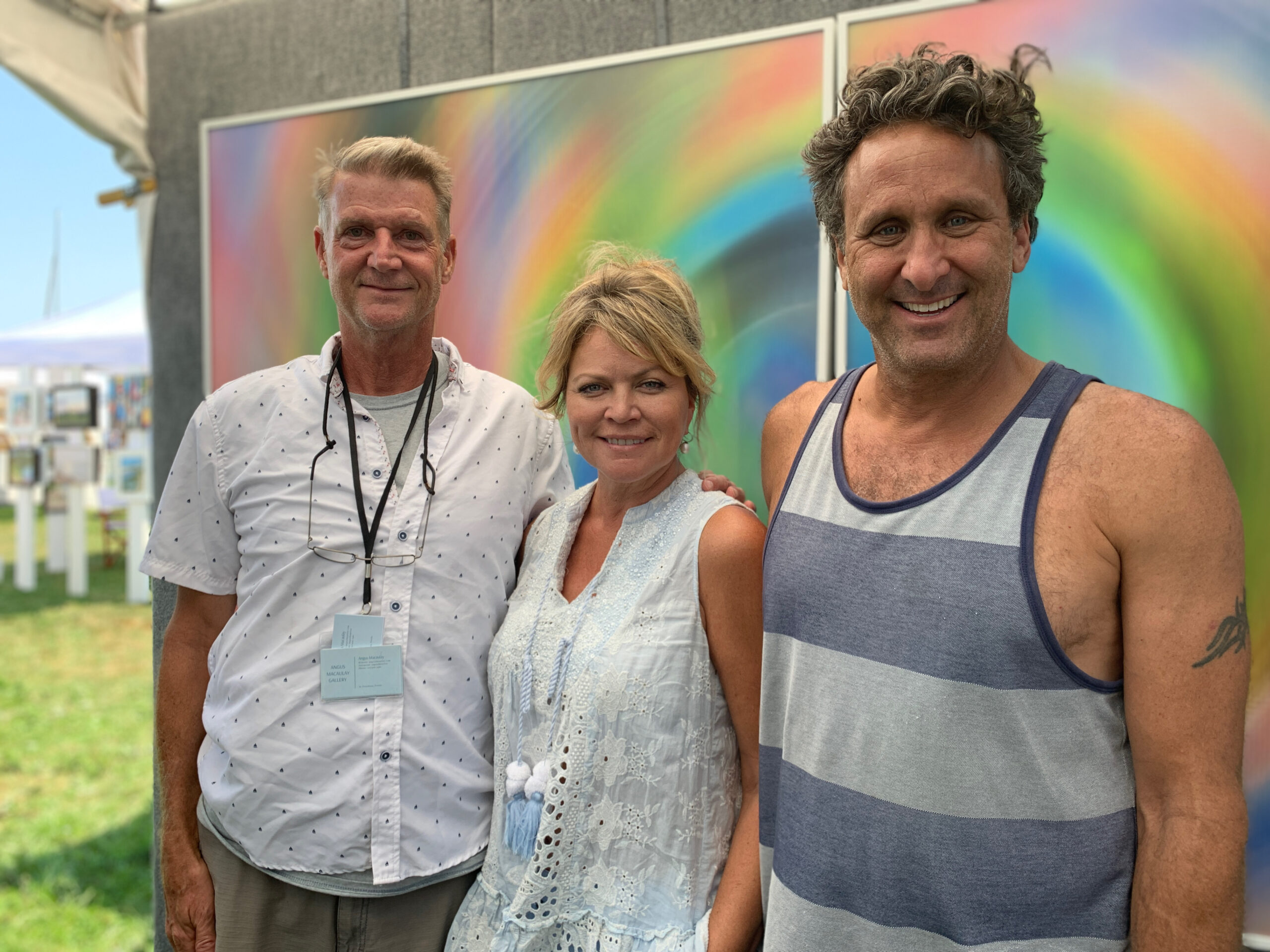 Artists Angus Macaulay, Joni Sarah White and Bruce Reinfeld at the Arts and Crafts Fair held during HarborFest weekend in Sag Harbor. ANNETTE HINKLE