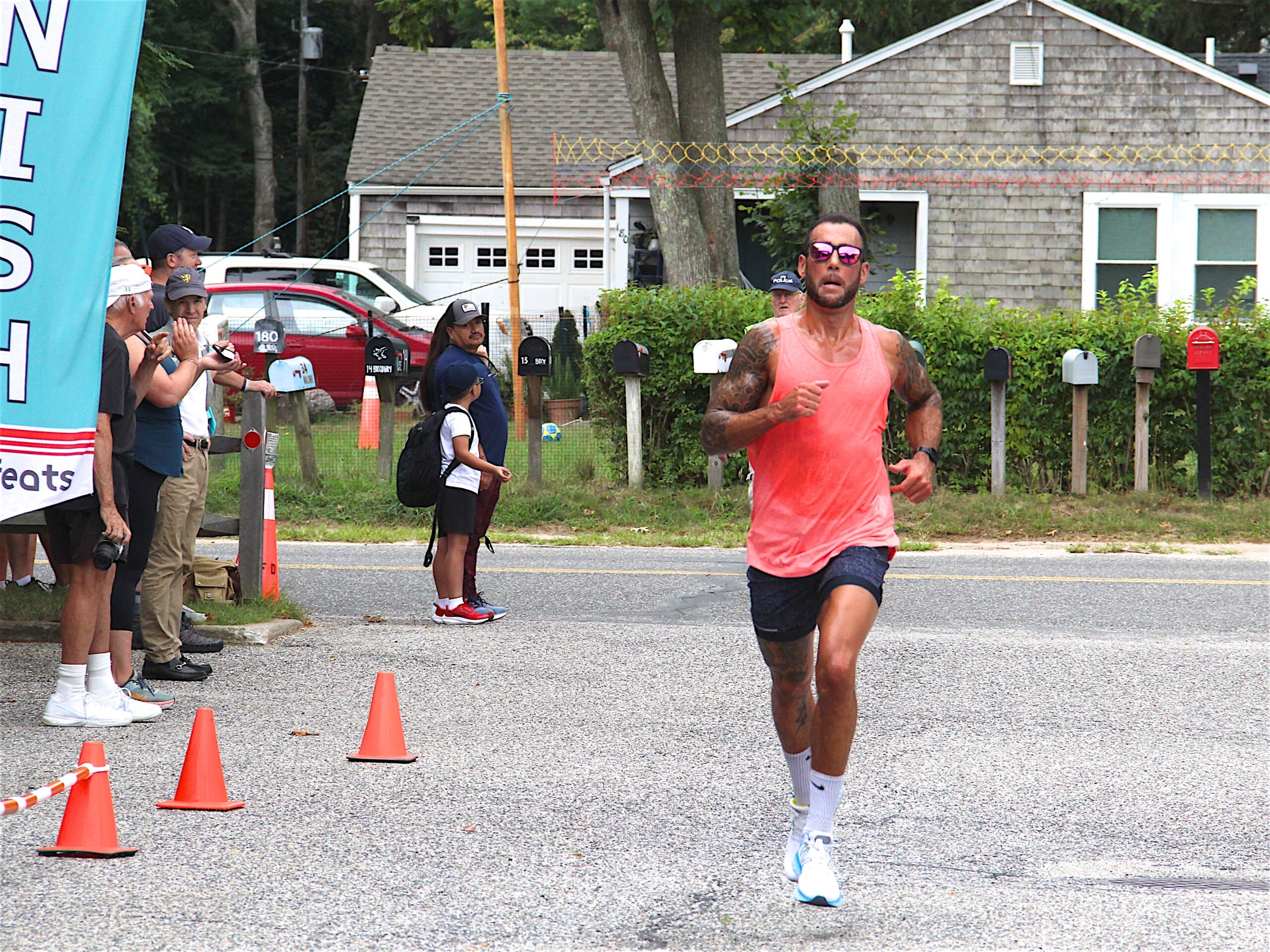 Neil Falkenhan of East Hampton won the 5K.     KYRIL BROMLEY