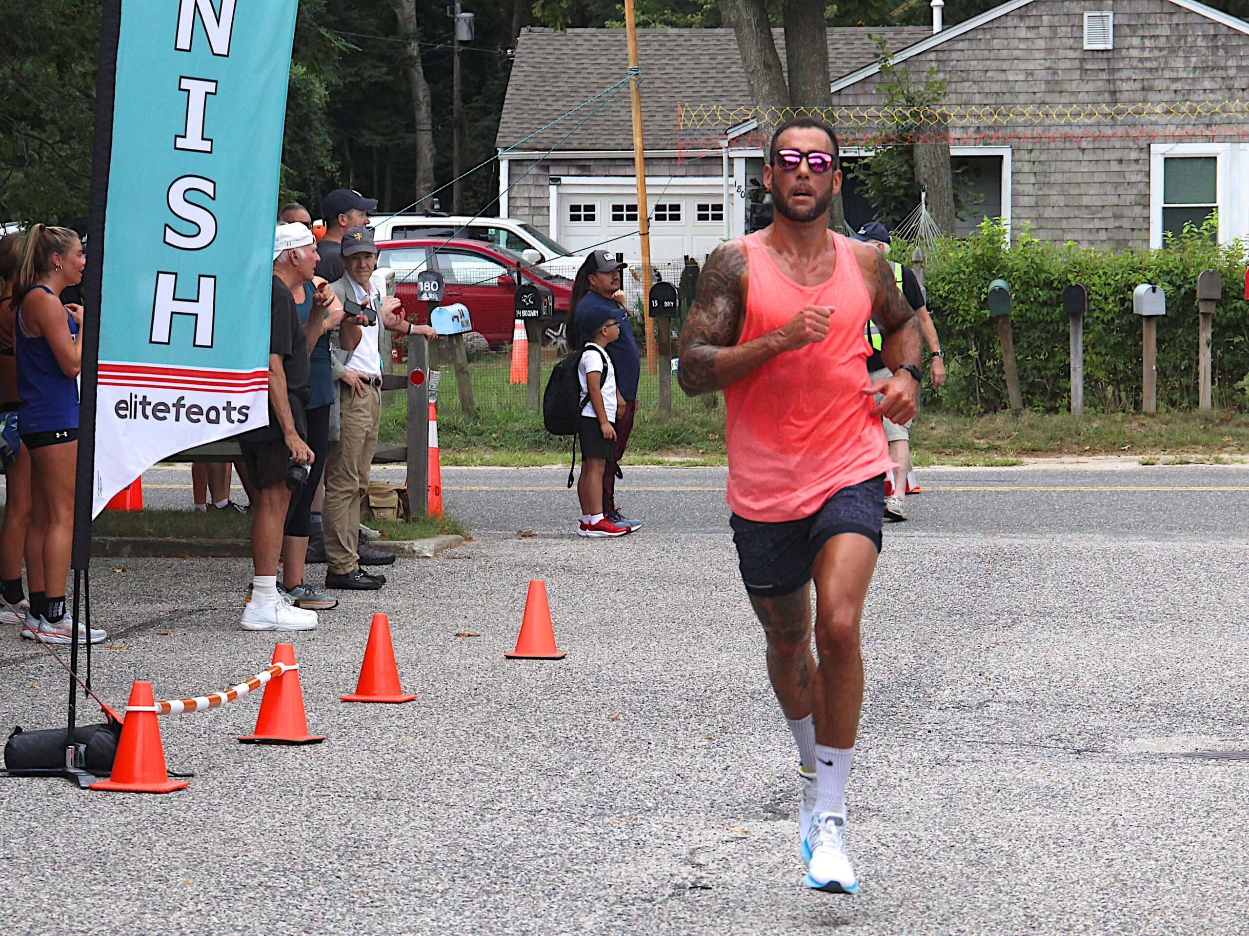 Neil Falkenhan of East Hampton won the 5K.     KYRIL BROMLEY