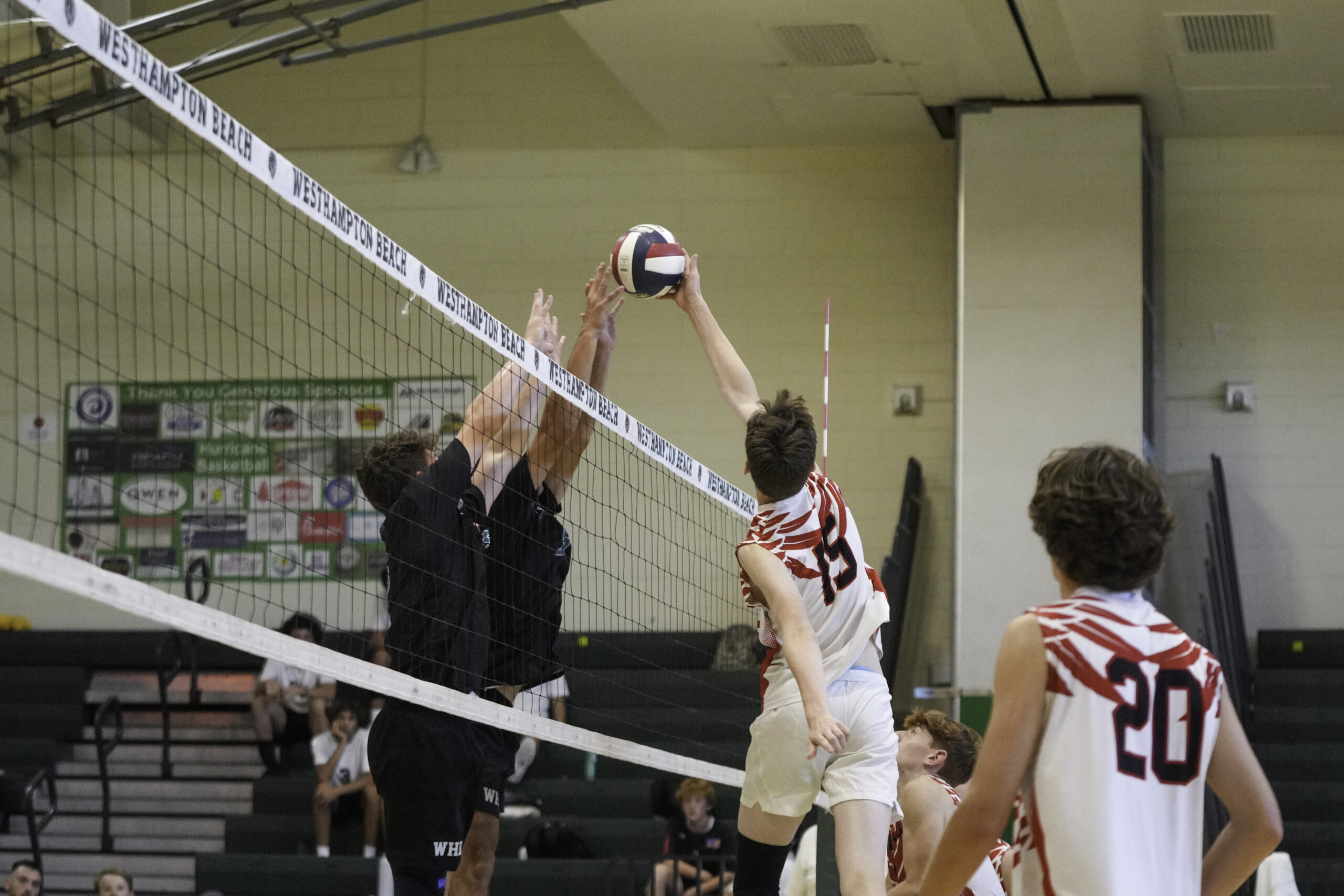 Junior middle blocker Will Jankowski and senior outside hitter Declan Kerns grab a block. RON ESPOSITO