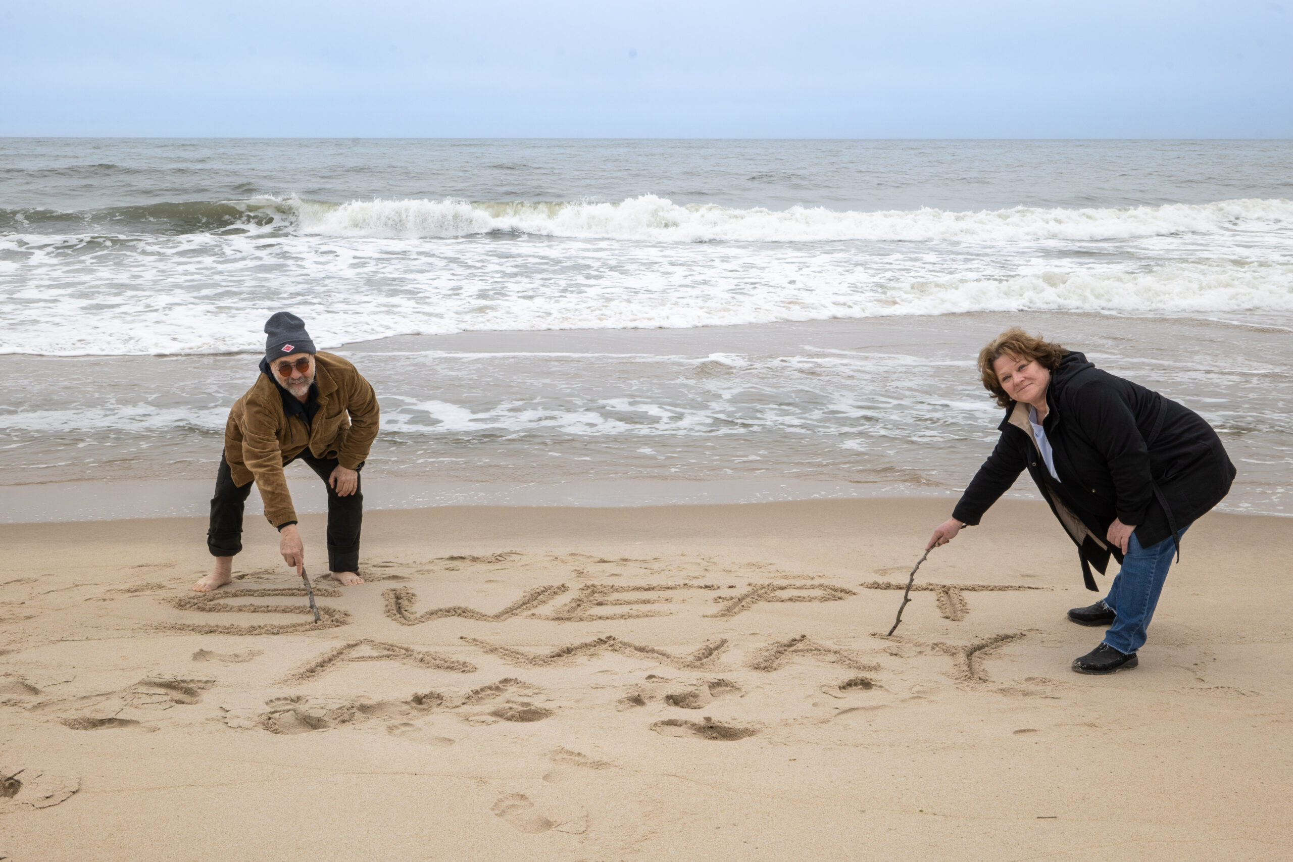 Christina Mossaides Strassfield and Warren Neidich at Main Beach. © JOE BRONDO FOR GUILD HALL