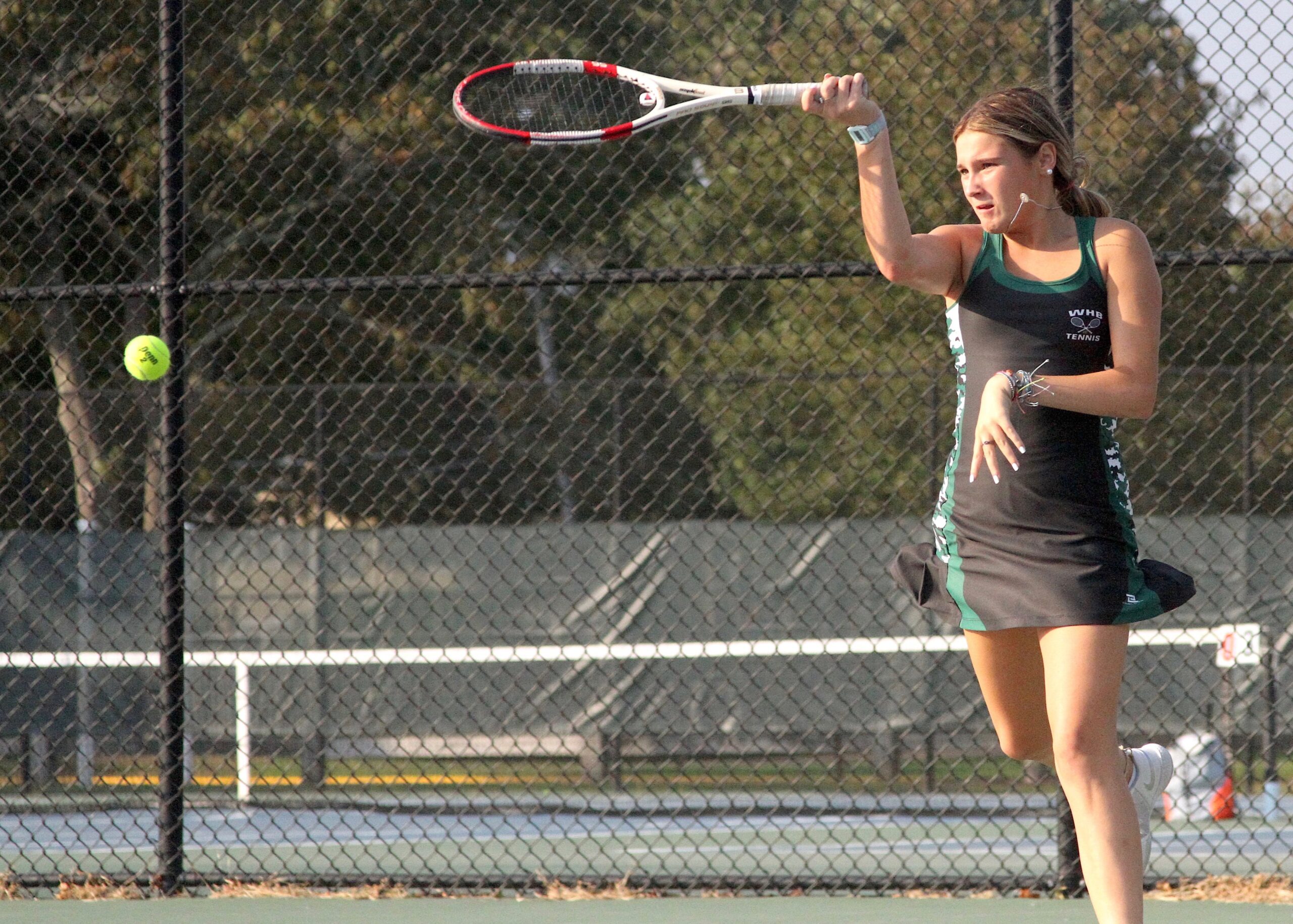 Westhampton Beach's Shannon Killoran keeps the rally going at first doubles. DESIRÉE KEEGAN
