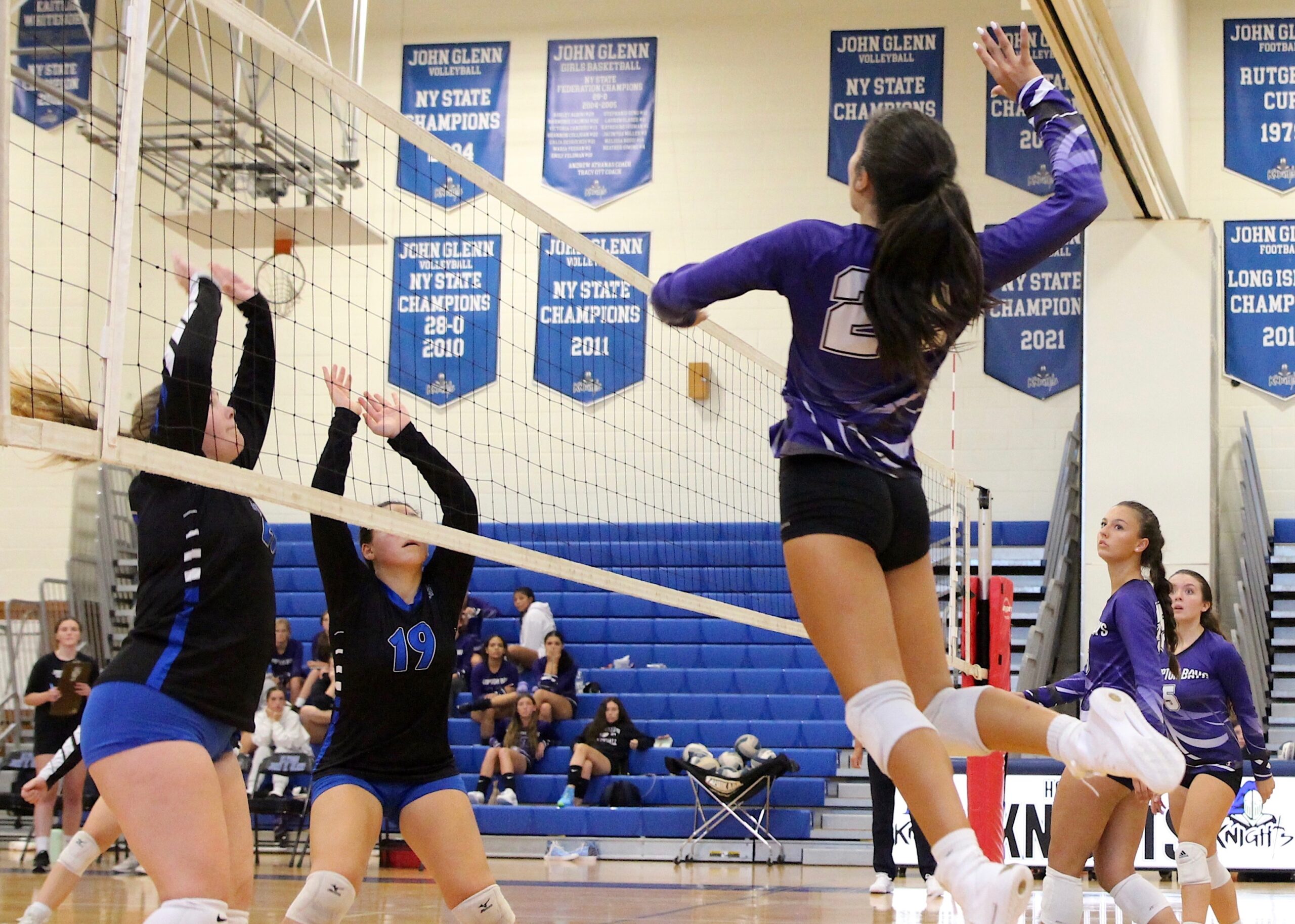 Junior outside hitter Tania Quiros reaches to spike the ball. MIA CAMEY