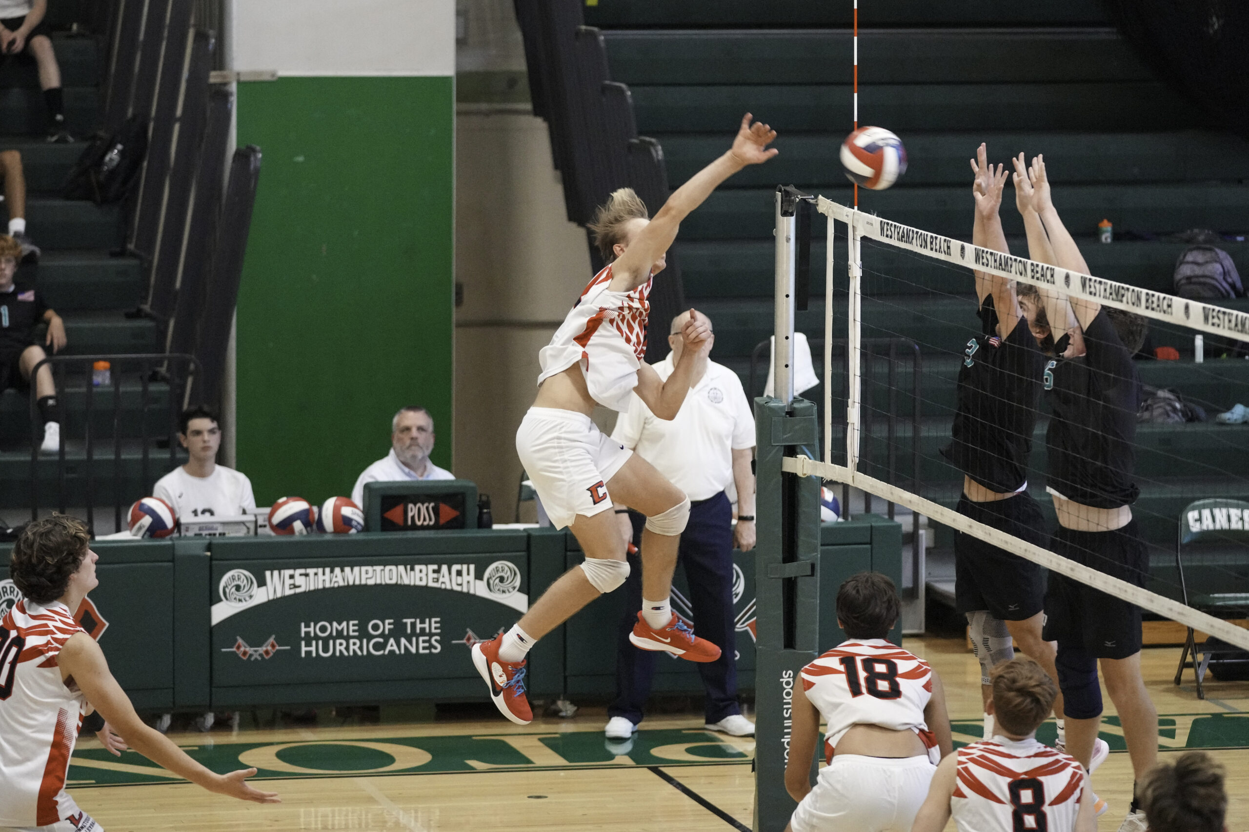 Junior setter Seth Terry and junior middle blocker Will Jankowski block a return. RON ESPOSITO