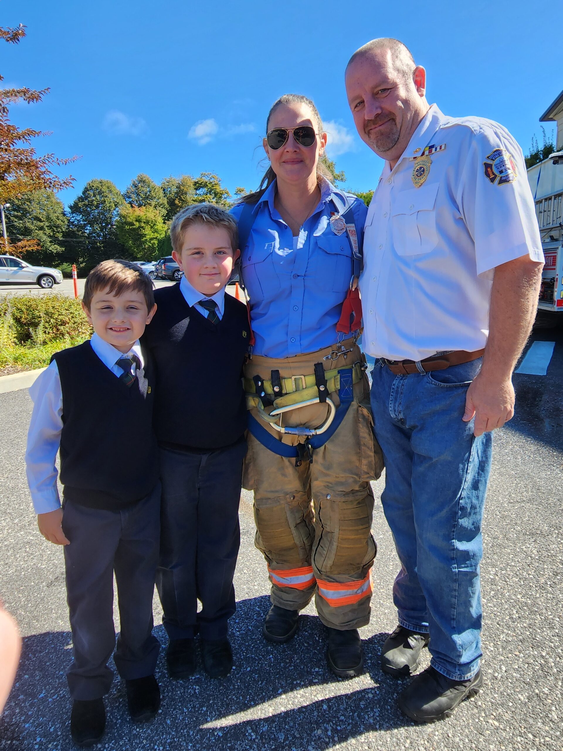 Our Lady of the Hamptons School hosted a fire safety day last week and firefighters Robin and Mike Kampf, whose sons Joseph and Michael, attend the school, talked to the students about fire safety. COURTESY OUR LADY OF THE HAMPTONS SCHOOL