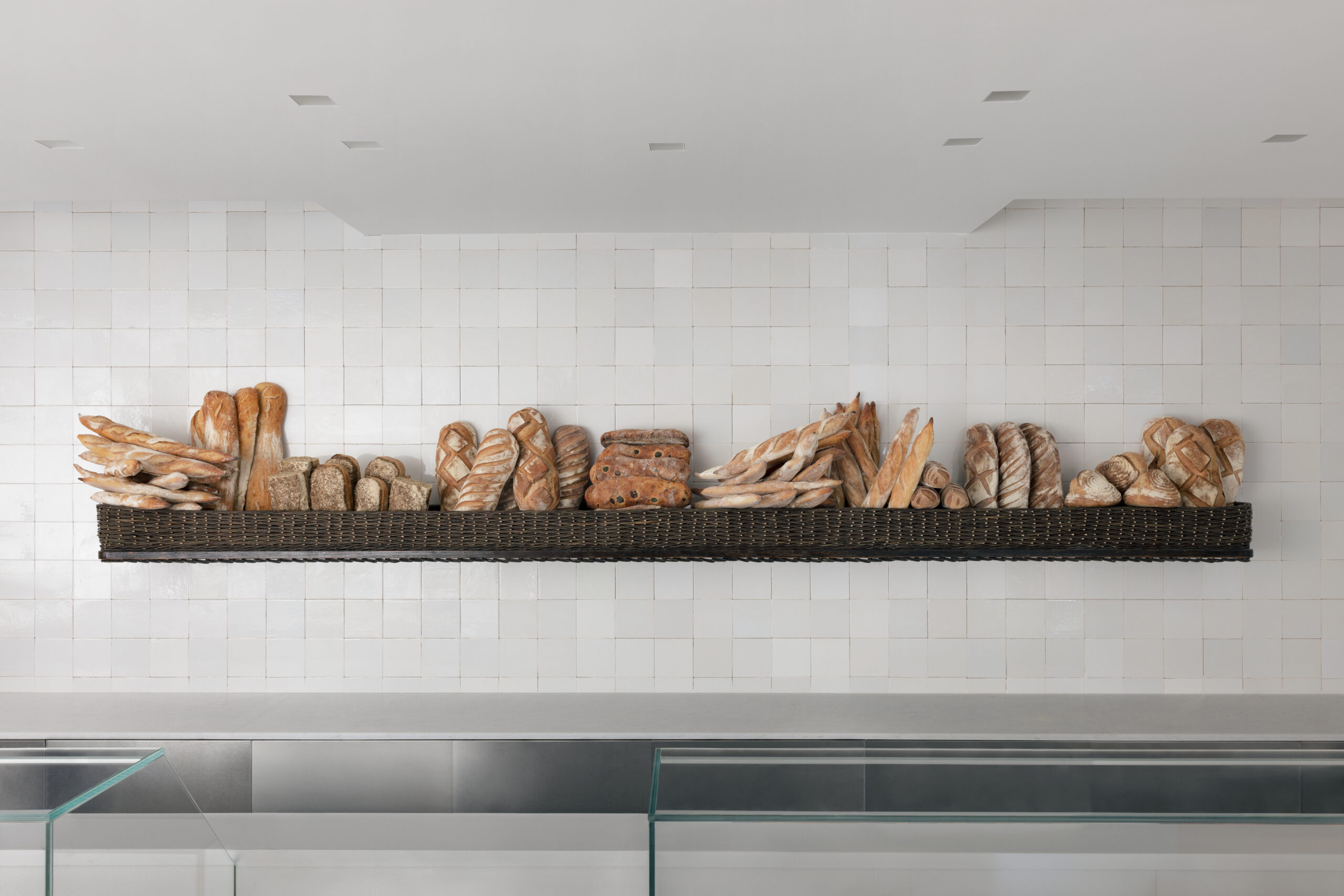 Loaves of bread on display in a custom-made wicker basket at Carissa's Bakery in Sag Harbor. ERIC PETSCHEK