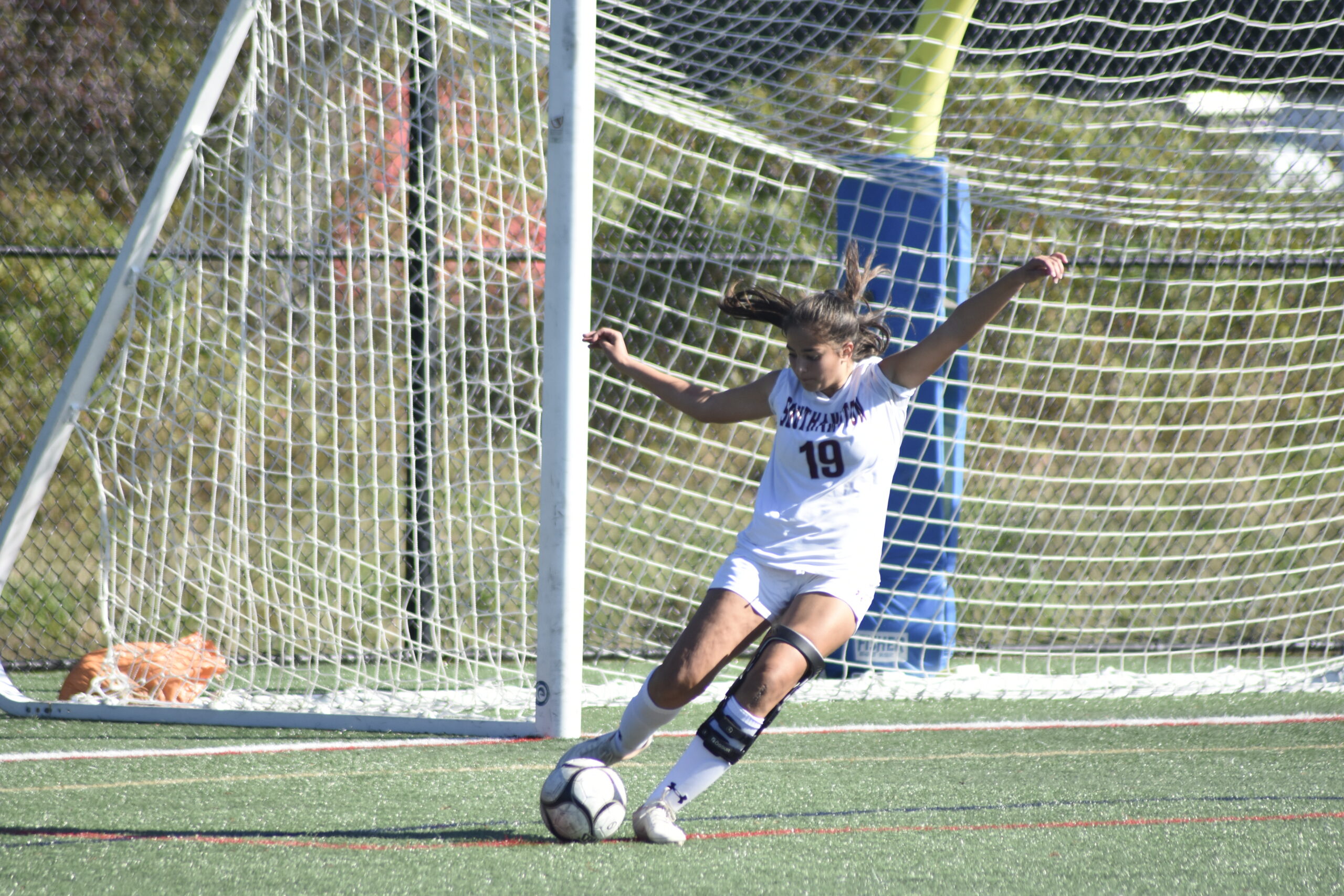 Southampton sophomore Leilani Escobar sends the ball to midfield off a goal kick.    DREW BUDD