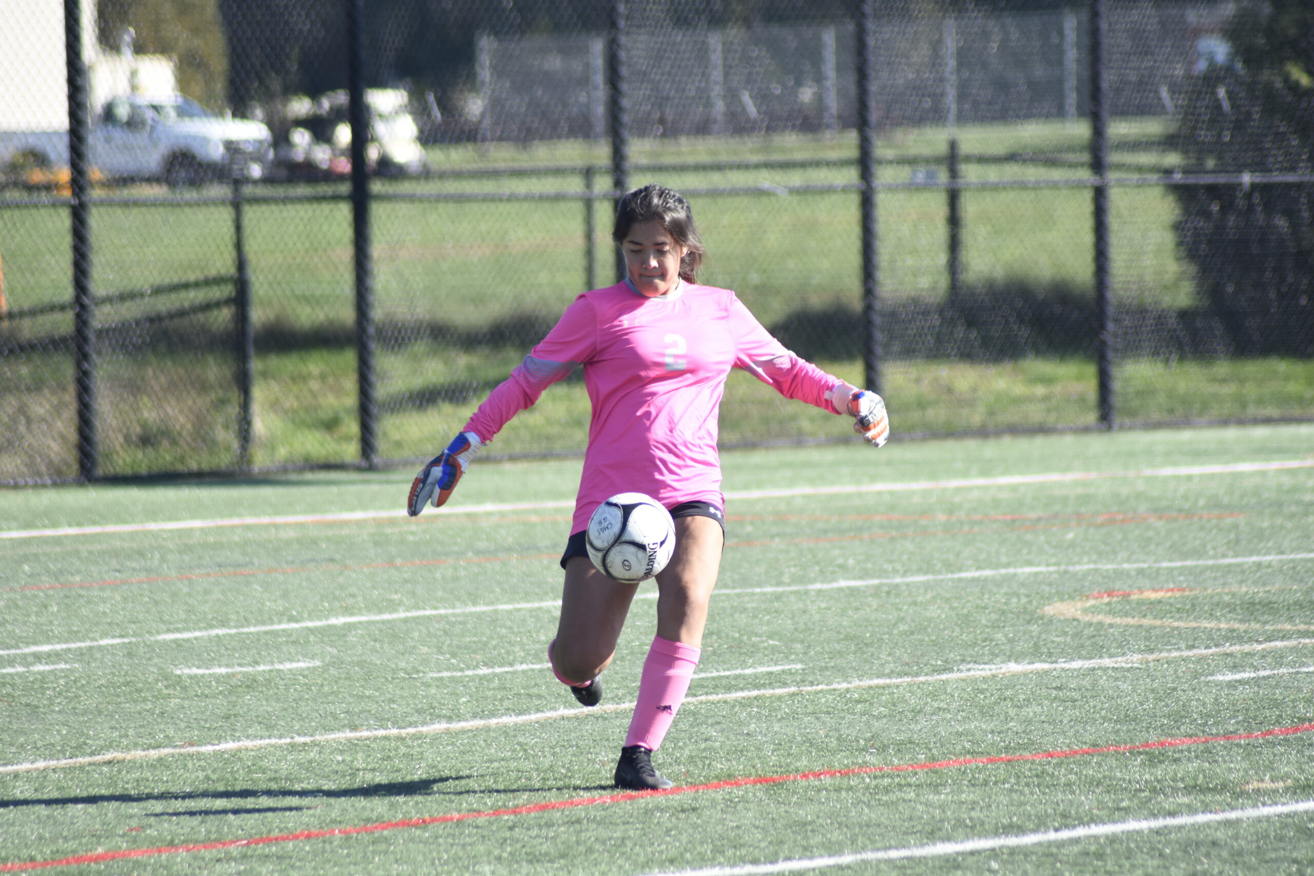 Southampton senior goalie Cece Ginsburg boots the ball.    DREW BUDD