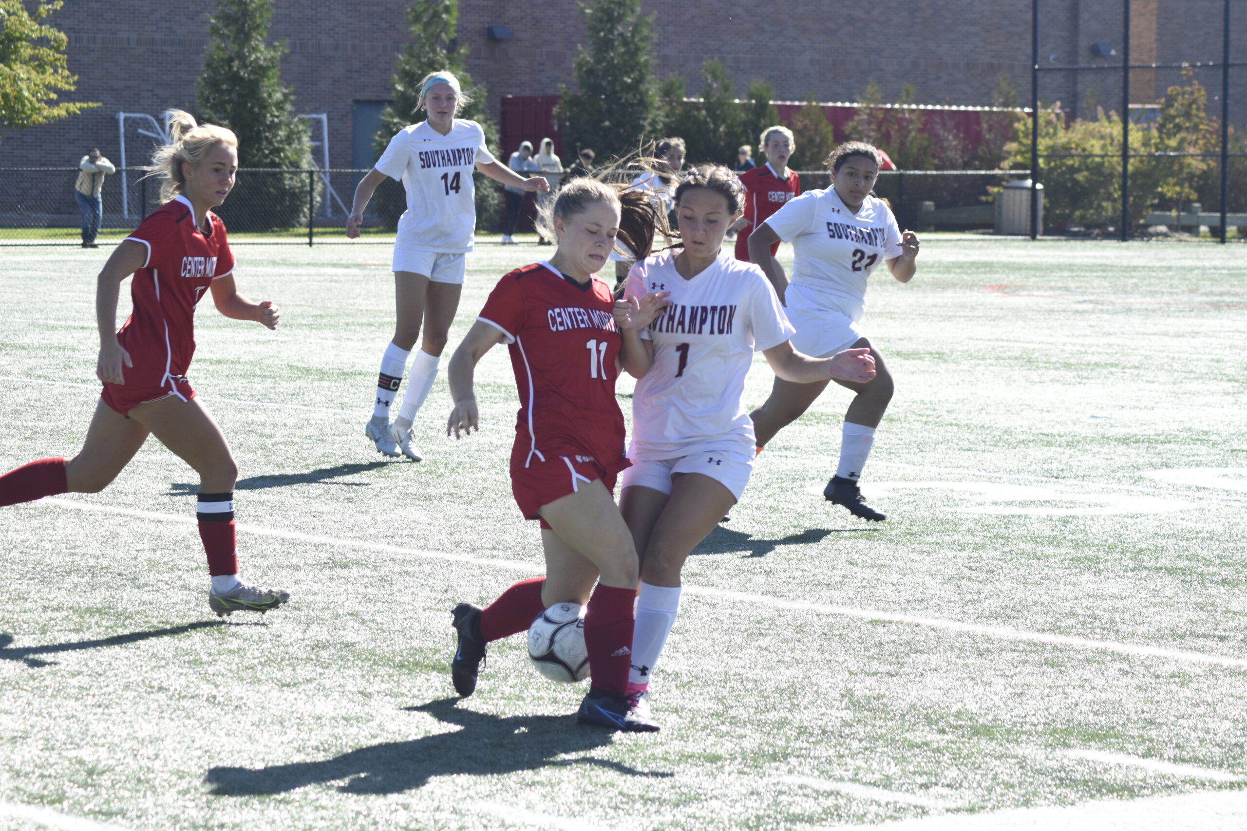 Southampton sophomore Anabella Fischette disrupts a Center Moriches player.    DREW BUDD