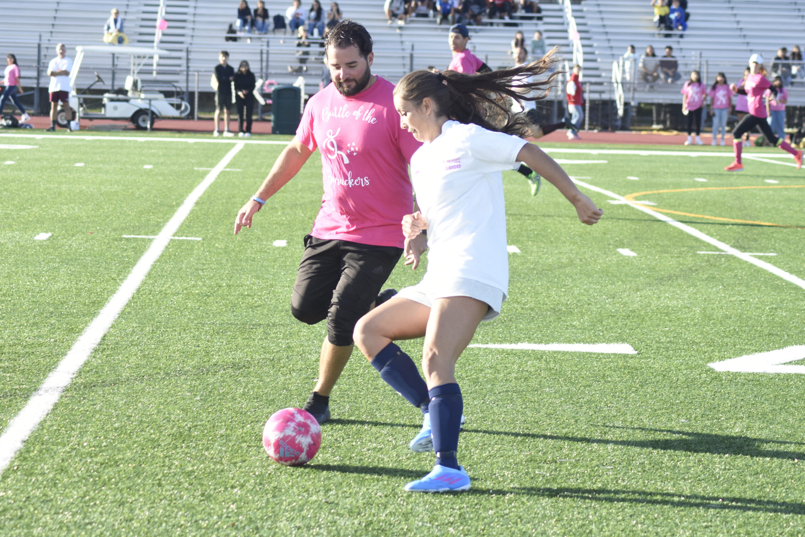 East Hampton varsity girls soccer assistant coach Joe DiGirolomo pressures Jena Arnister.     DREW BUDD