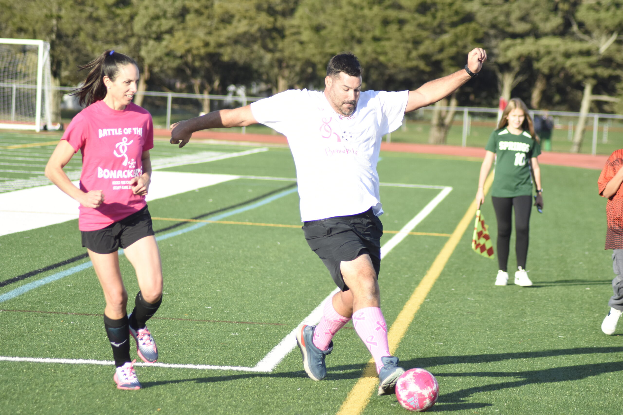 East Hampton Middle school math teacher Nicholas Finazzo tries to keep the ball inbounds.   DREW BUDD