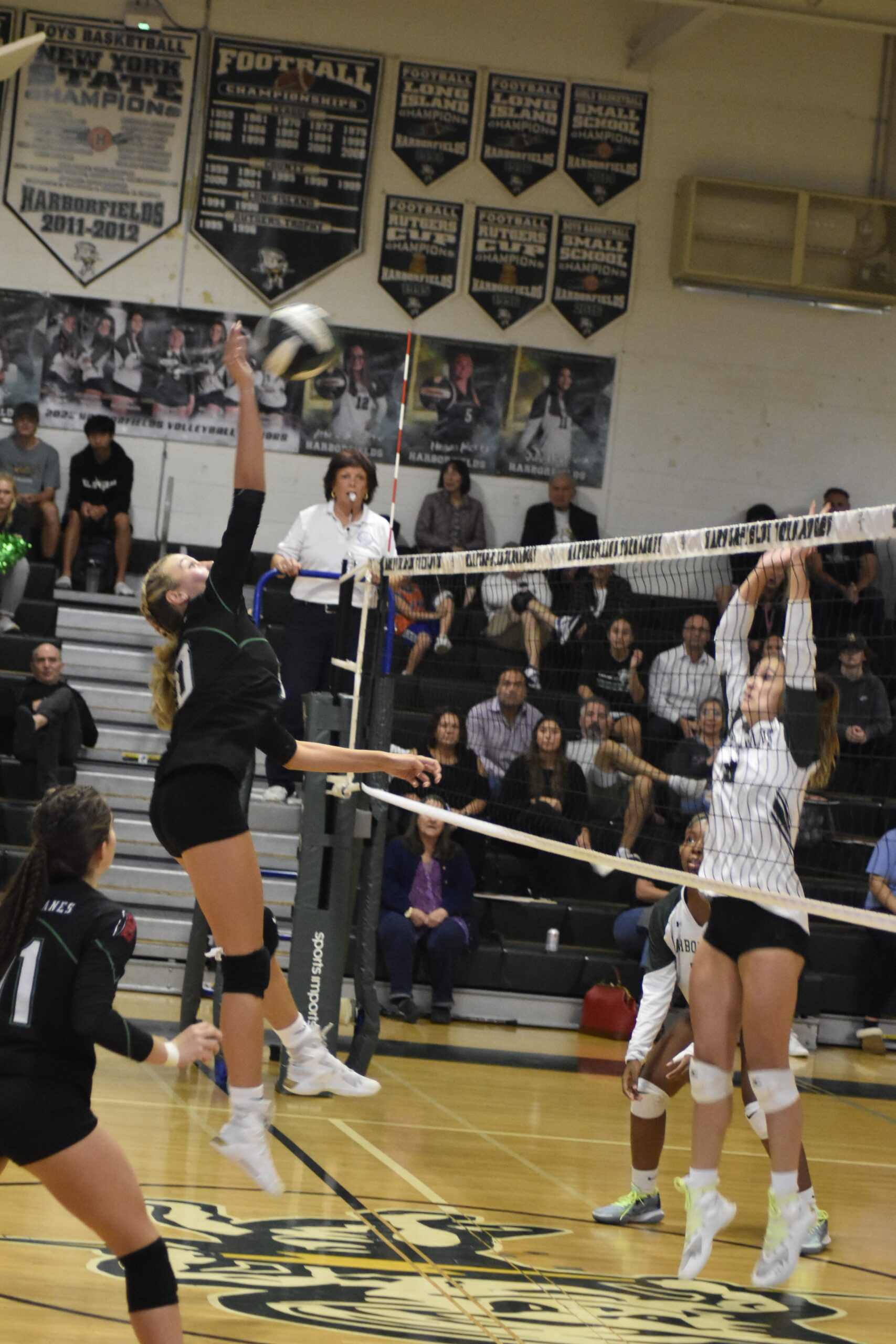 Westhampton Beach sophomore Karly Pascale sends the ball over the net.   DREW BUDD