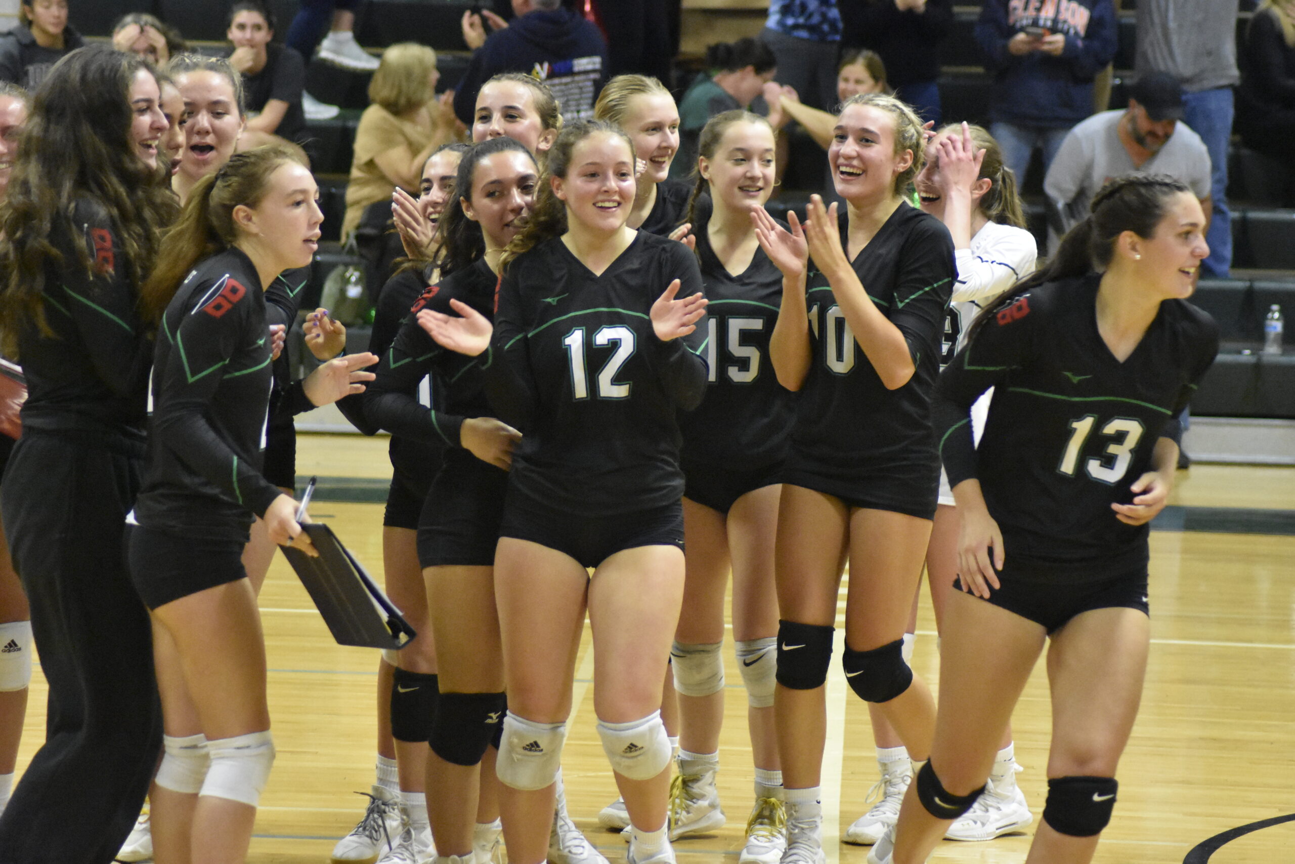 The Westhampton Beach girls volleyball team defeated host Harborfields, 3-2, on Tuesday night to advance to the county semifinals.    DREW BUDD
