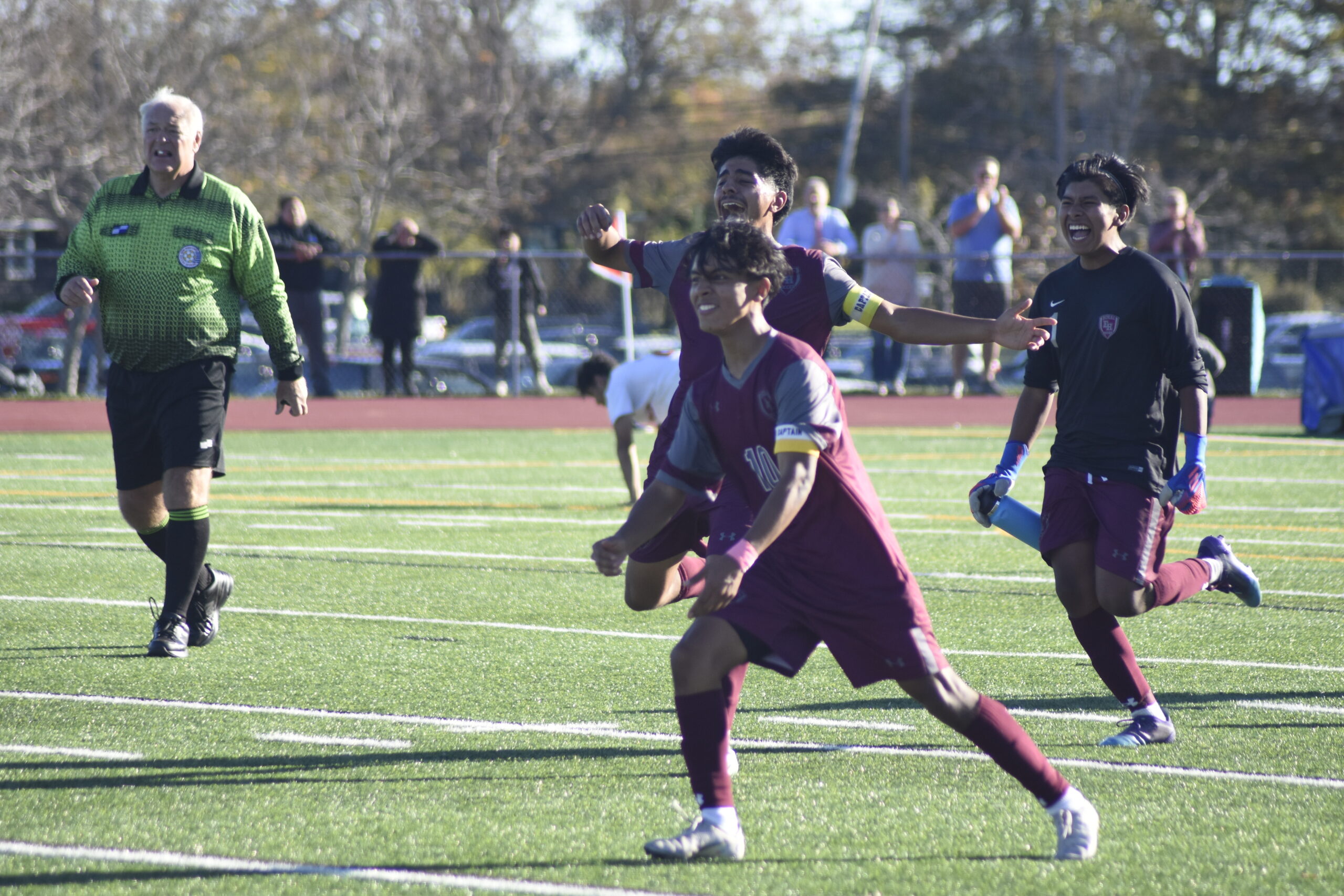 Eric Armijos, Michael Figueroa and the rest of the Bonackers are pumped after their 2-1 victory over East Islip on Thursday sent them to the Suffolk County Class A semifinals.   DREW BUDD