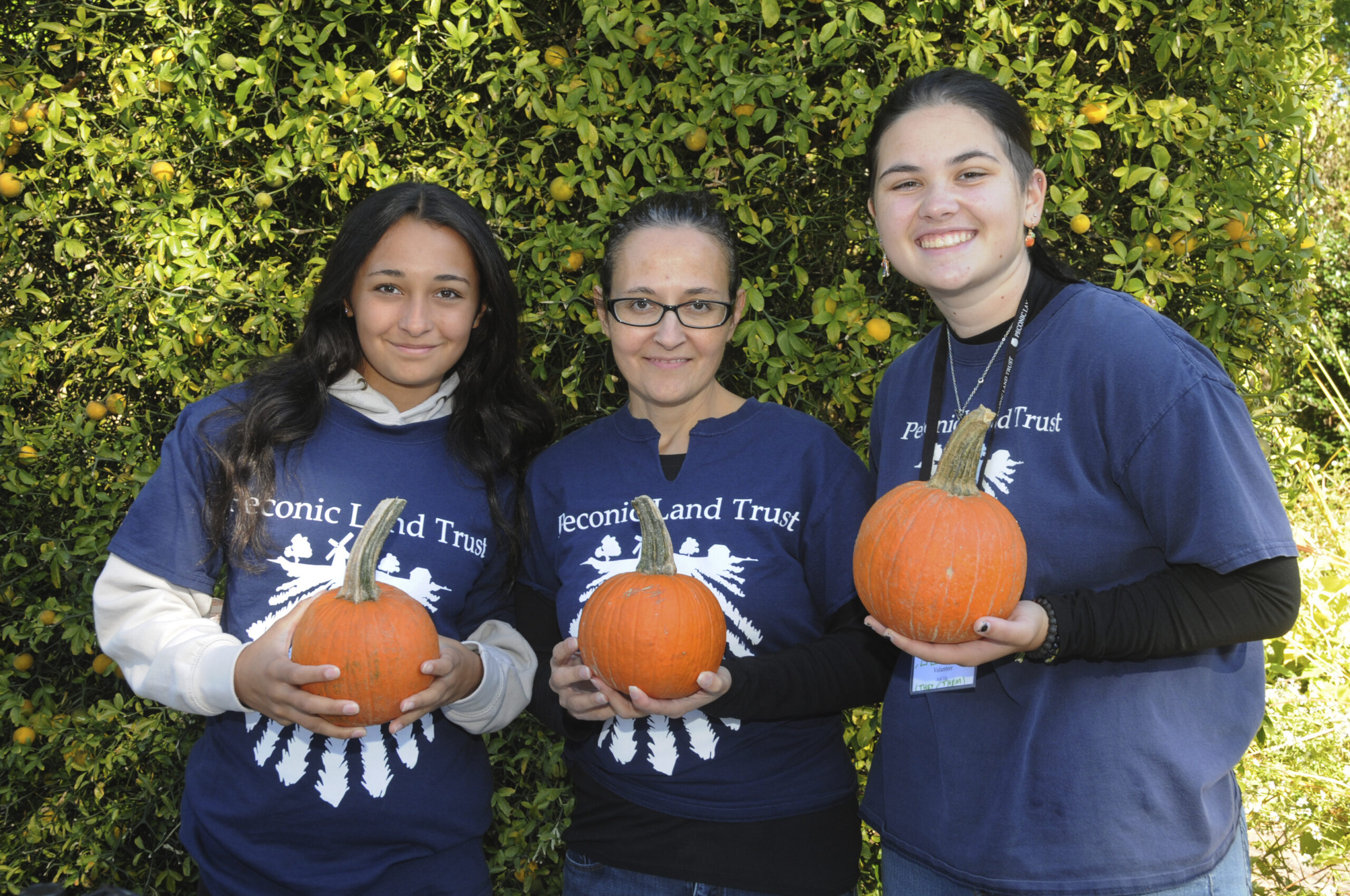 Sara Mikula, Lori Mikula and Moe Kennedy at Bridge Gardens  Autumn Open House on Saturday. Activities included sauerkraut making, bulb planting, wood frame decorating, leaf rubbing, pine cone birdfeeder making, pumpkin painting, a scavenger hunt, tours by Jackson Dodds, and more.   RICHARD LEWIN