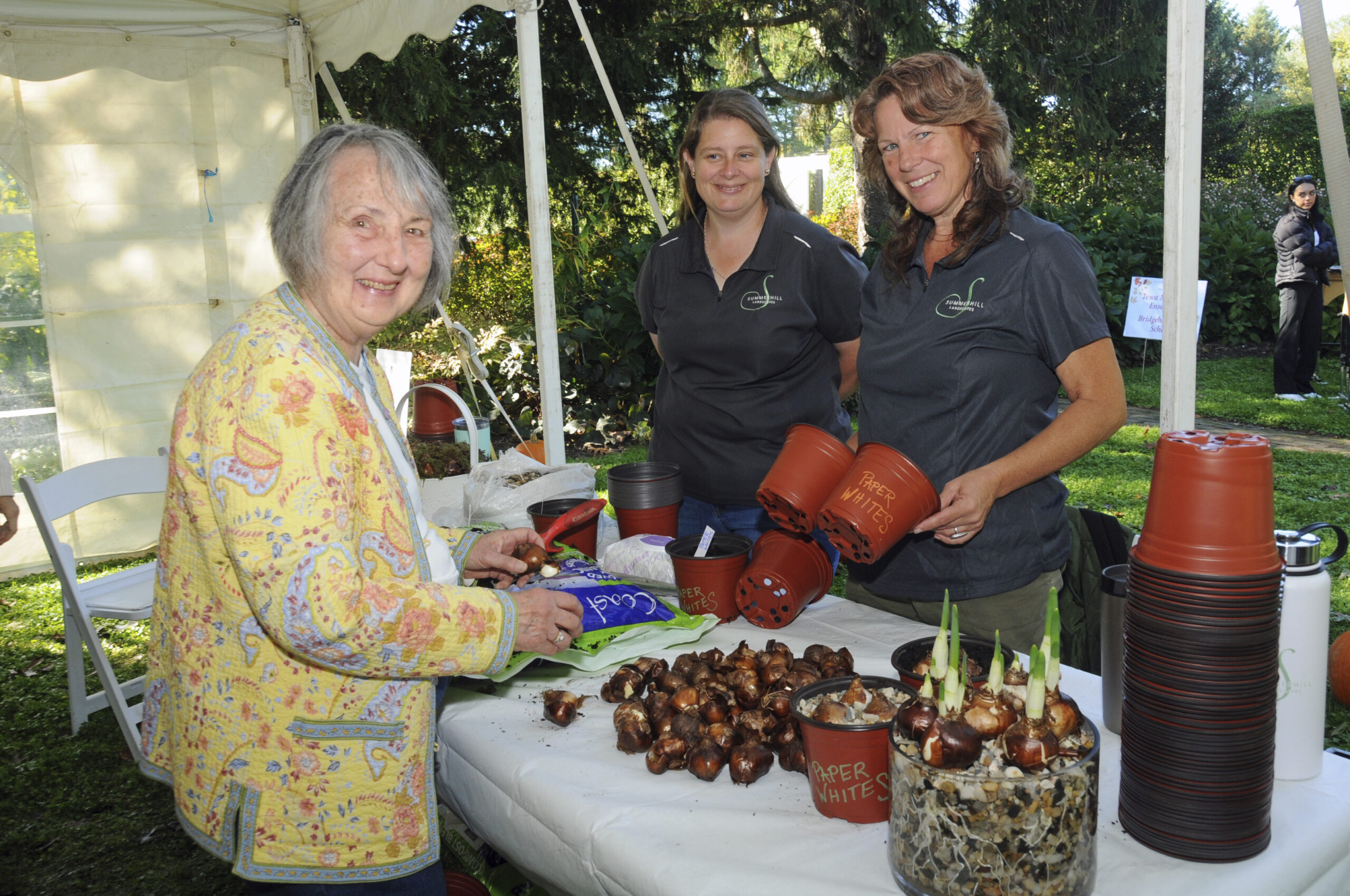 Carla Ash, Norma Taylor and Laurie Swanberg at Bridge Gardens  Autumn Open House on Saturday. Activities included sauerkraut making, bulb planting, wood frame decorating, leaf rubbing, pine cone birdfeeder making, pumpkin painting, a scavenger hunt, tours by Jackson Dodds, and more.   RICHARD LEWIN