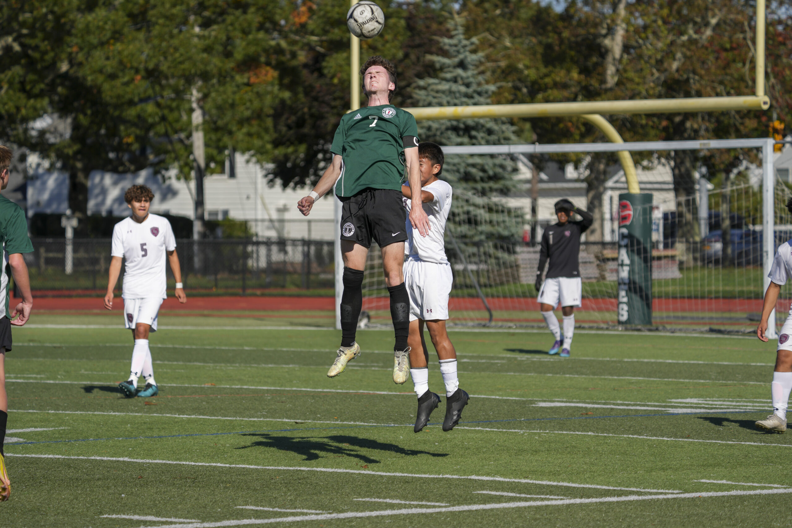 Westhampton Beach senior Ethan Vogt heads the ball.   RON ESPOSITO