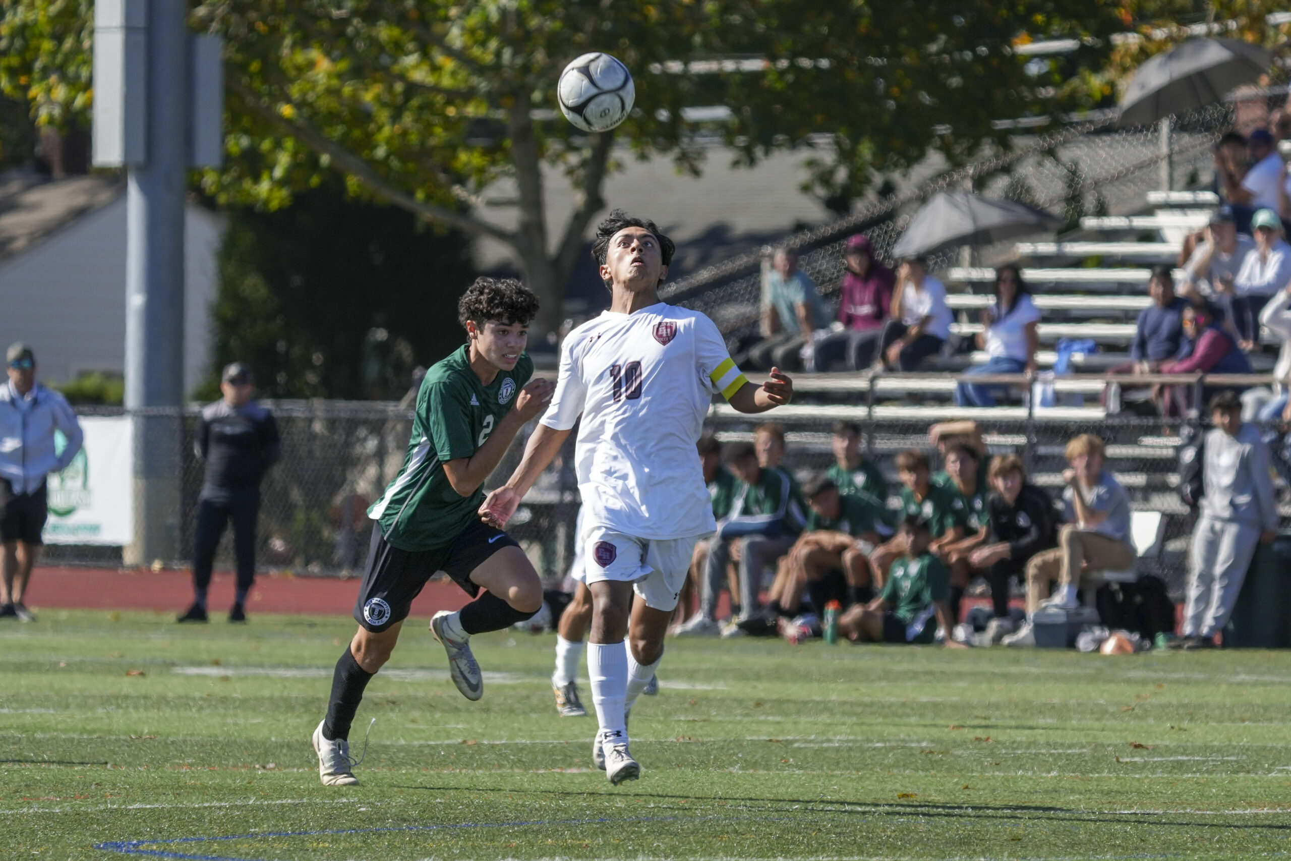 East Hampton senior co-captain Eric Armijos keeps his eyes on a bouncing ball.   RON ESPOSITO