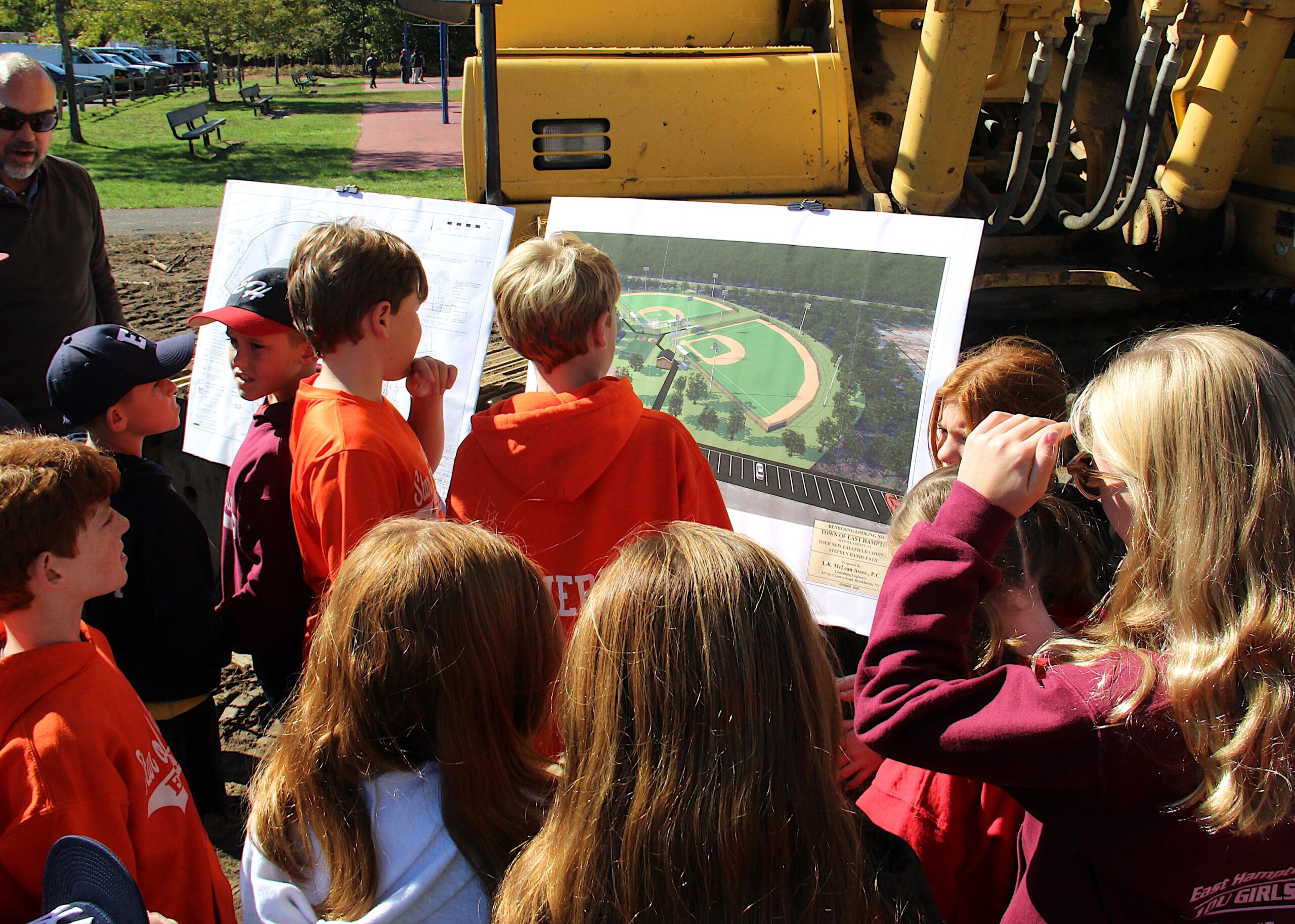 Prospective East Hampton Little League players check out renderings of what will be new fields.    KYRIL BROMLEY