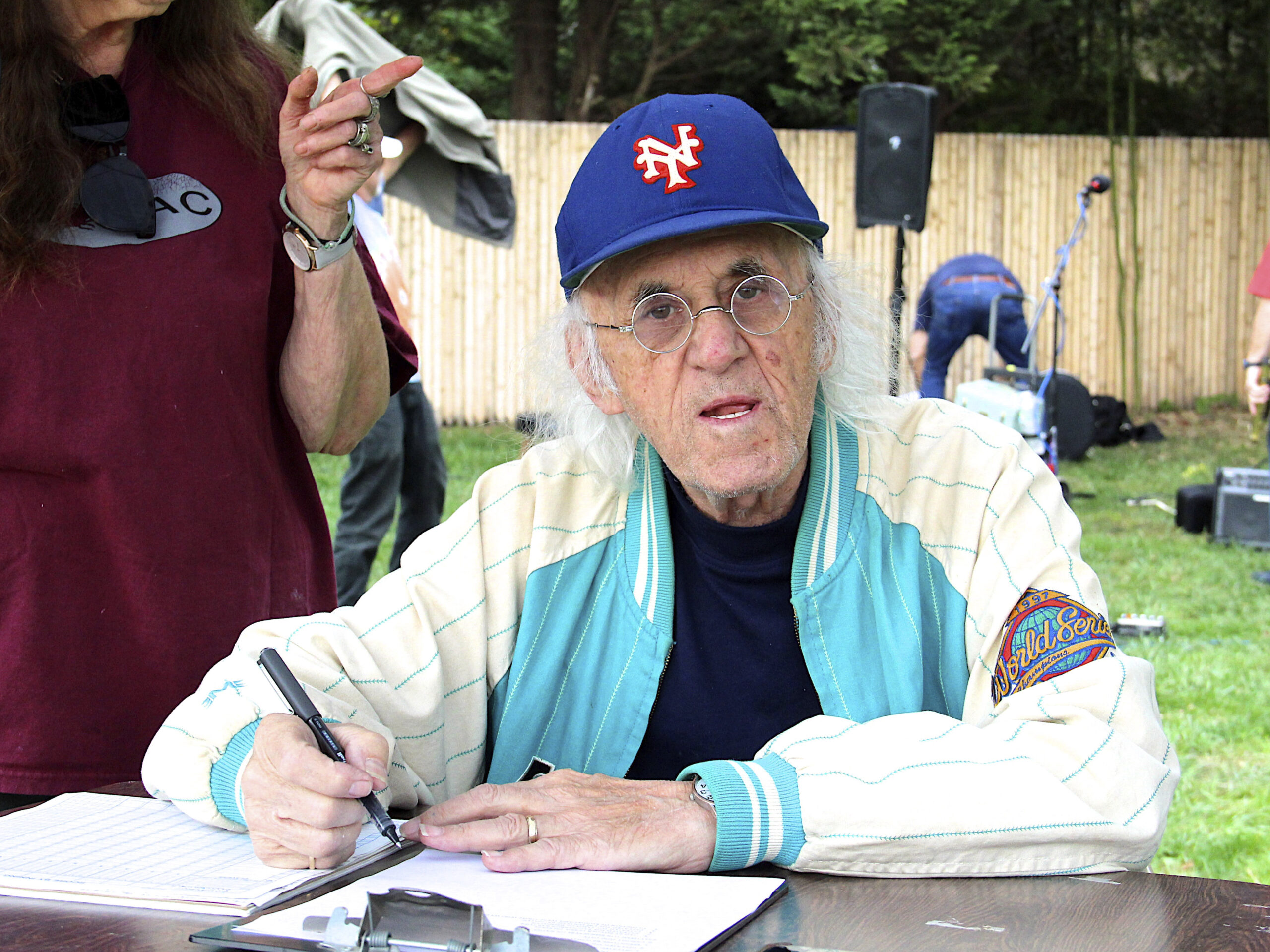 Scorekeeper and announcer Hugh King at the Bonac versus Maidstone softball game on October 16 Hosted by the East Hampton Historical Farm Museum at the East Hampton High School field. The Bonac team was victorious with a score of 13-4.  KYRIL BROMLEY