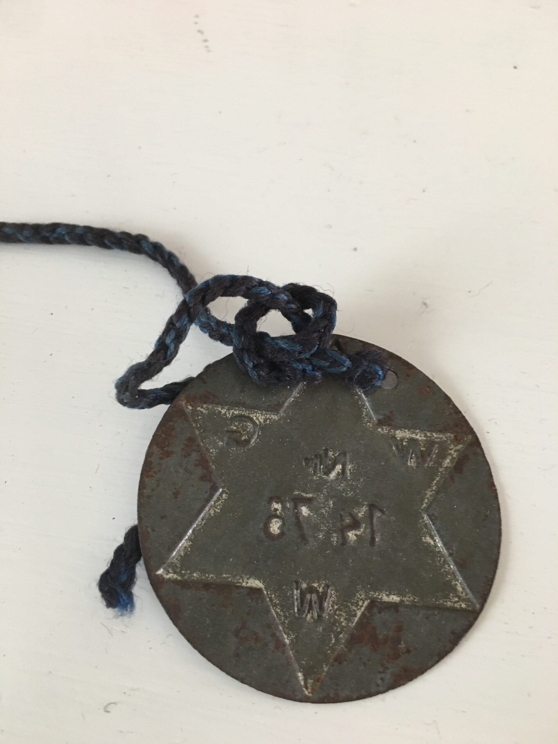 Suzanne Miller's mother had the gold Star of David she was required to wear during the war bronzed and turned into a piece of jewelry, which Miller wore on her visit to Auschwitz. SUZANNE MILLER