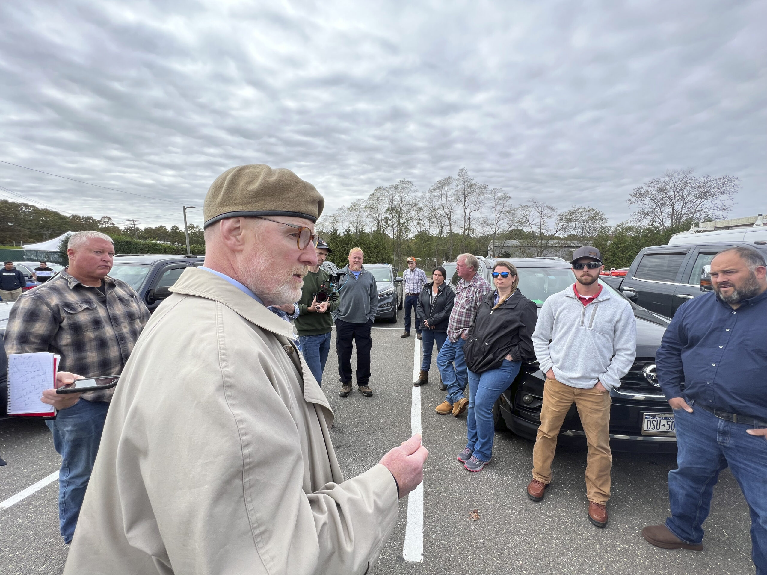 Attorney Daniel G. Rodgers with baymen, members of CFAR, Montauk Surfcasters, Long Island Beach Buggy Association and  the New York Sportfishing Federation at Southampton Town Justice Court on Town Justice Court on Tuesday.  DANA SHAW