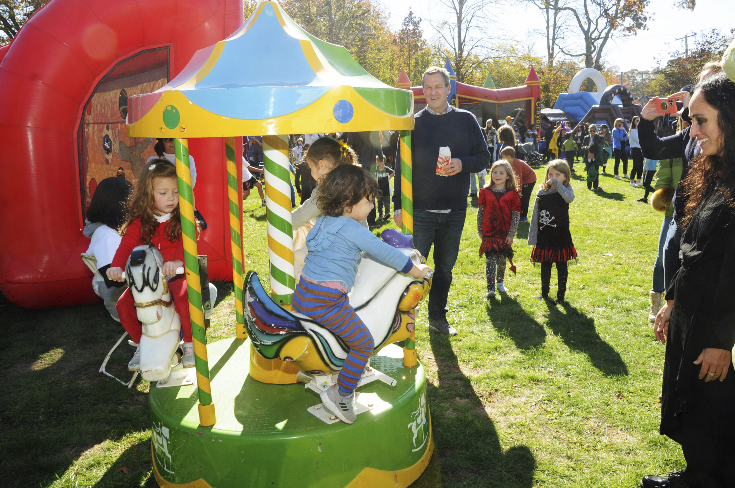 The Kiwanis Club of East Hampton returned to the grounds of the American Legion Post in Amagansett on Sunday with its 23rd Annual Family Fun Day. Guests enjoyed the Bouncy House and other amusement park fun, live music, crazy costumes, a dragon, a man on stilts and plenty more. Kiwanis President Rick White supervised the barbecue and immediate past President Henry Uihlein was the conductor of the famous Kiwanis Express Train.    RICHARD LEWIN