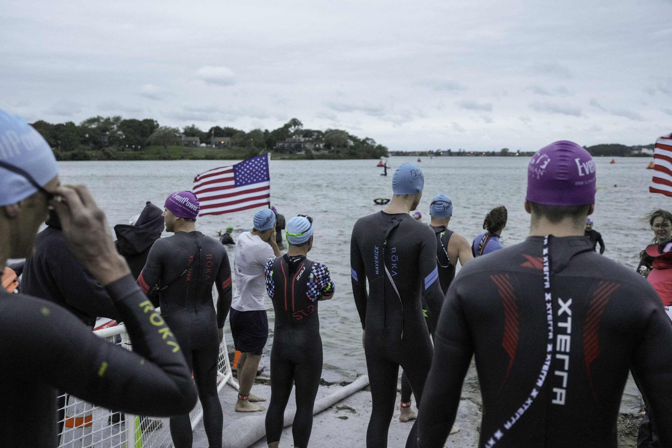 Triathletes get ready for the start of the day's races.   RON ESPOSITO