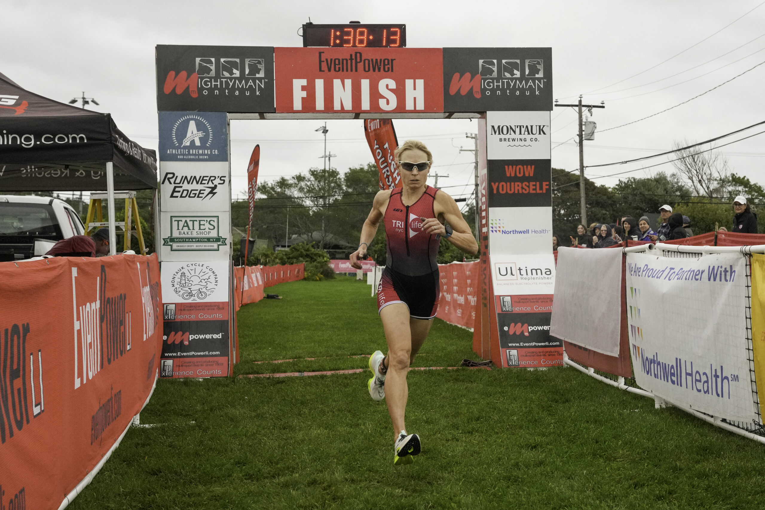 Kristen Neimeth was the first woman to cross the finish line of the sprint tri.    RON ESPOSITO
