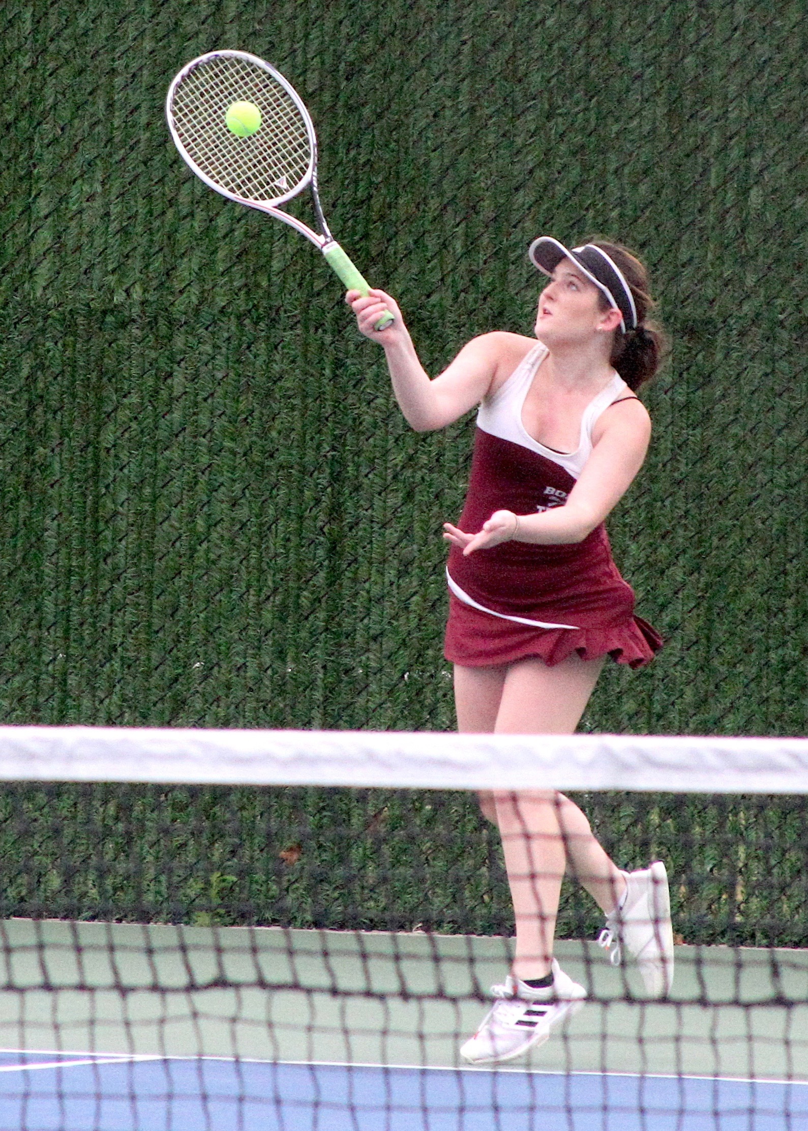 Pierson junior Rachel Monaco serves.