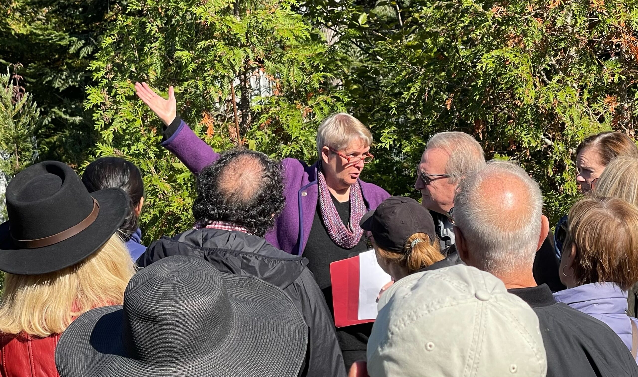 The Remsenburg Academy and the Westhampton Historical Society sponsored a historic walk of homes on the hamlet's South Country Road.  Stephanie Davis, who lead the tour, provided historical background at the Remsenburg Academy.  COURTESY MARGARGET BRUSH