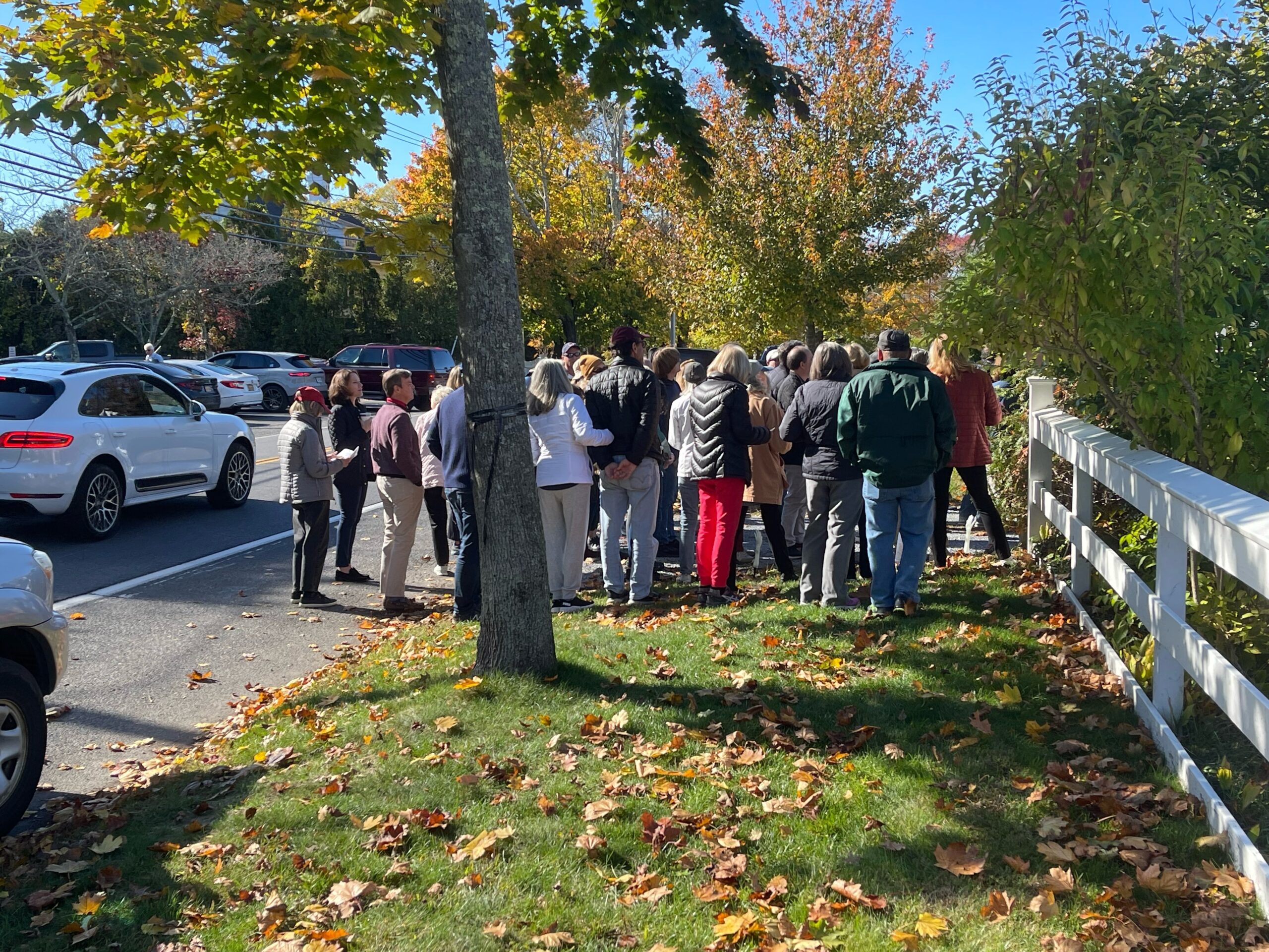 The Remsenburg Academy and the Westhampton Historical Society sponsored a historic walk of homes on the hamlet's South Country Road.  Stephanie Davis, who lead the tour, provided historical background at the Remsenburg Academy.  COURTESY MARGARGET BRUSH