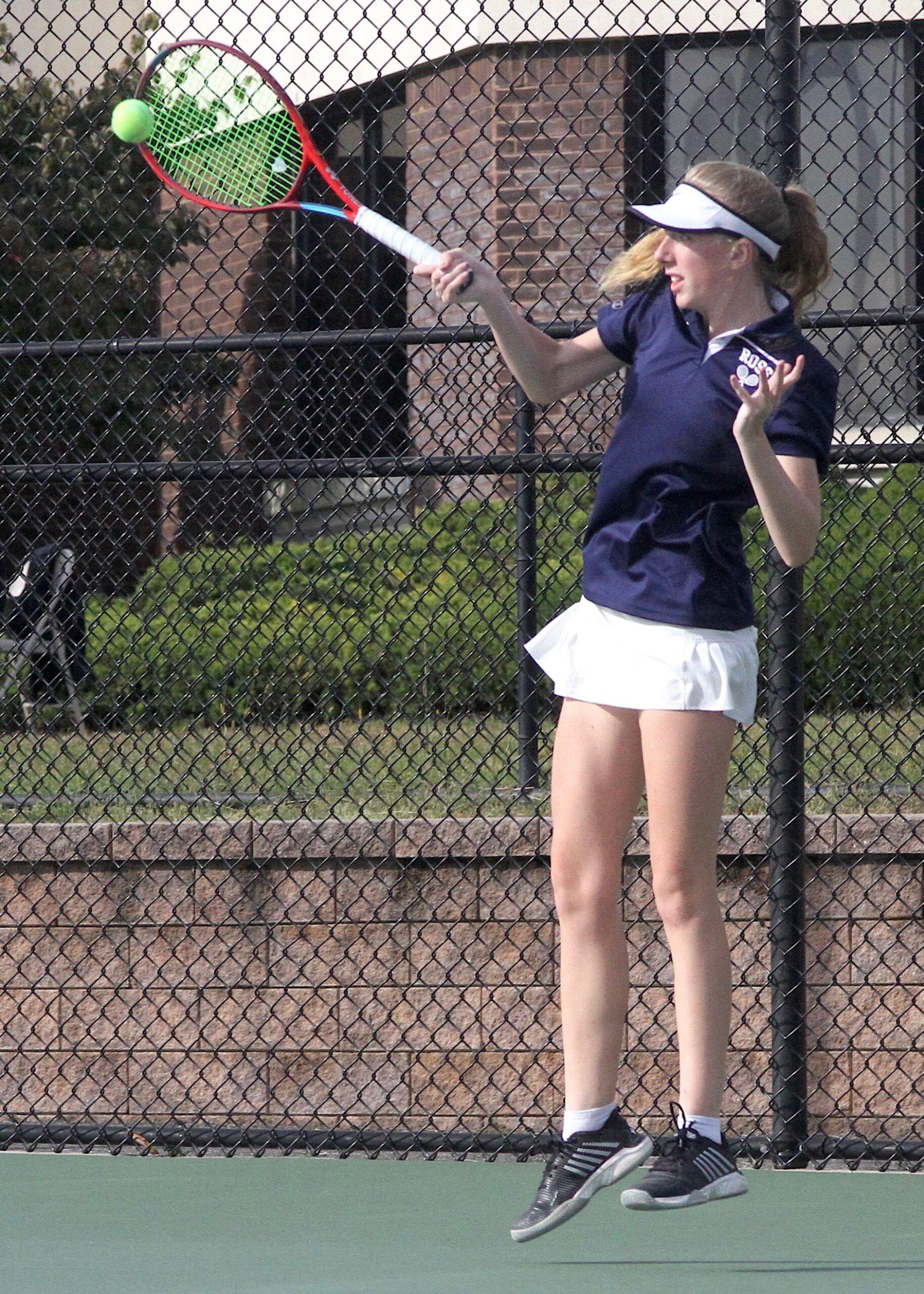 Ross senior Emmy Winter sends the ball back over the net. DESIRÉE KEEGAN