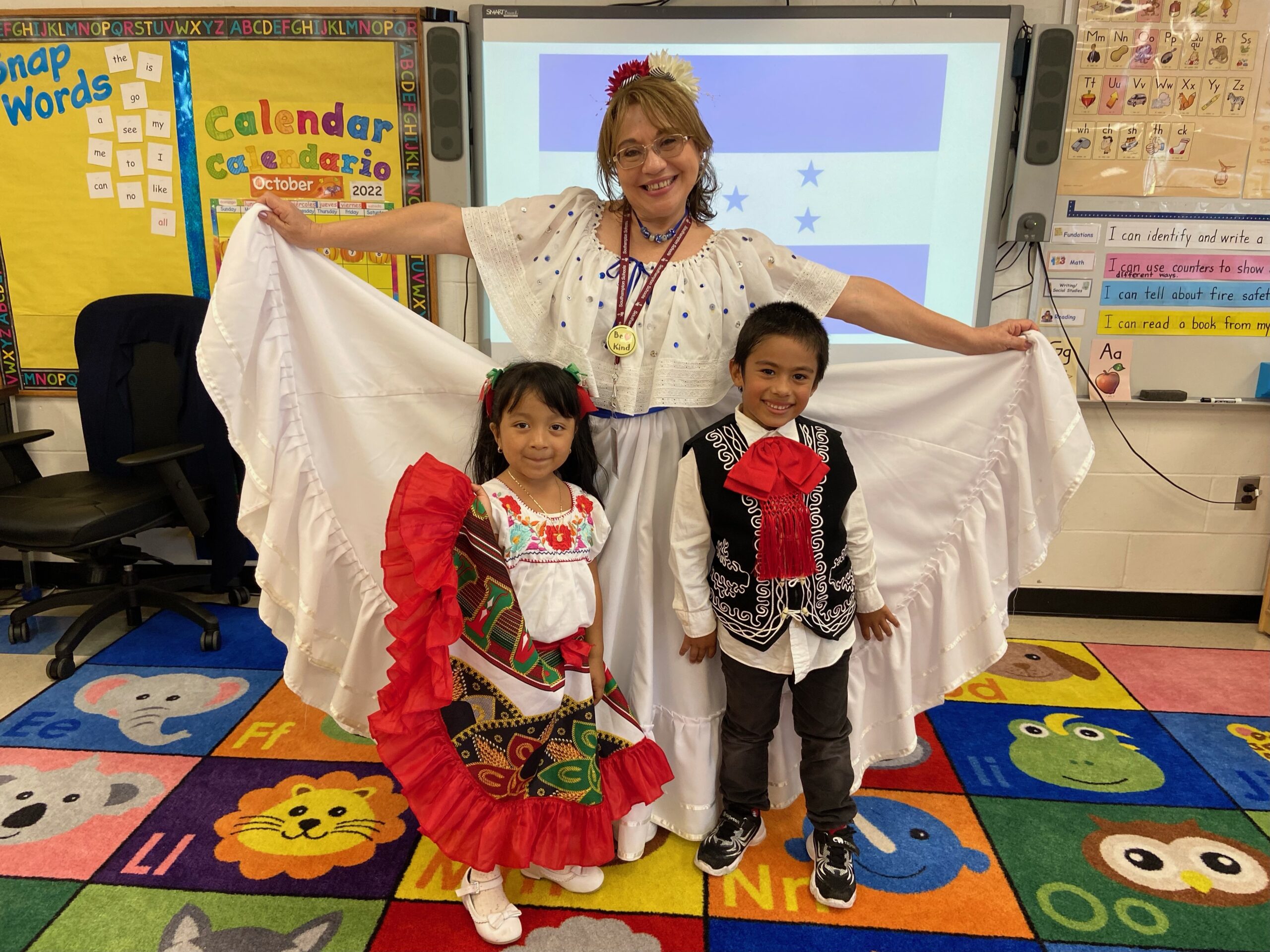 Students at Southampton Elementary School, including teacher Gina Hernandez and students Danna Rosas and Santiago Zavala Garcia, recently celebrated Hispanic Heritage Month by learning more about Hispanic cultures, Traditions and famous individuals through books, art and dancing.  COURTESY SOUTHAMPTON SCHOOL DISTRICT