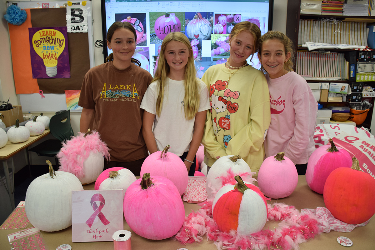 Southampton Intermediate School students, including, from left,Julia Vail, Reese Swiatocha, Mateya Silvera and Cameron Kieffer, raised breast cancer awareness recently through a “Think Pink” pumpkin event.