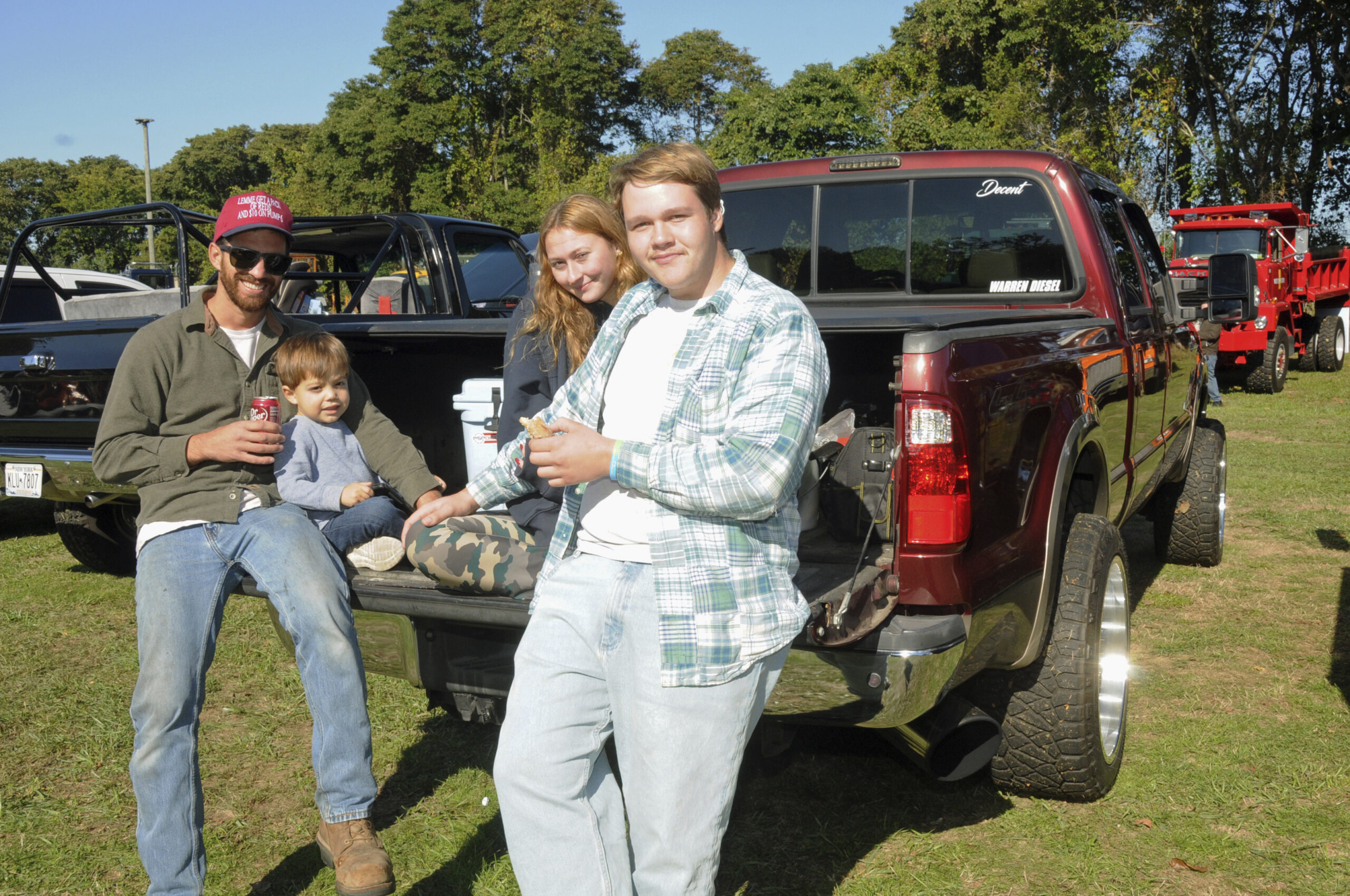 Matt and Hudson Cuomo with McKenzie Simons and Joshua Tudor at the annual Tyler Valcich Memorial Car Show on Sunday on the grounds of Amagansett Fire House. Established in 2015 by The Tyler Project (tylerproject.org) to commemorate the loss of Tyler to suicide in 2014, and to raise awareness of mental health concerns and cyberbullying. The Car Cruise around Montauk took place right after.   RICHARD LEWIN