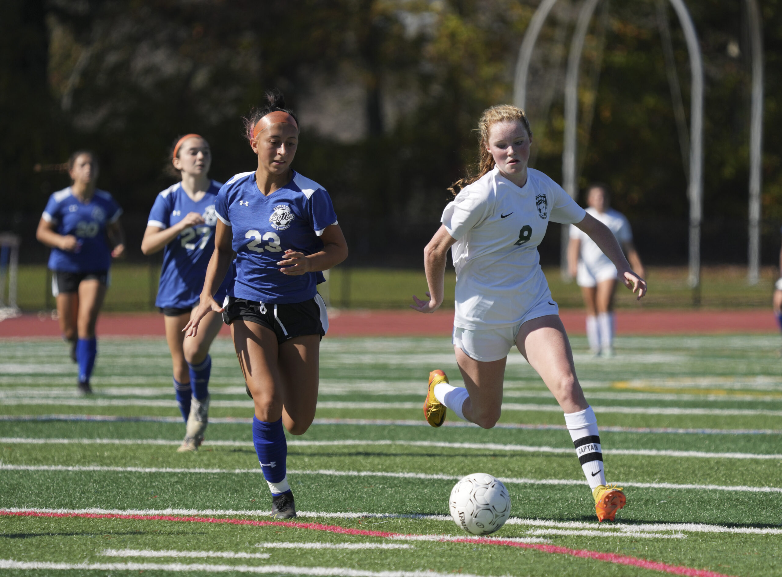 Westhampton Beach junior Sarah Gormley works the ball against a Hauppauge defender.    RON ESPOSITO