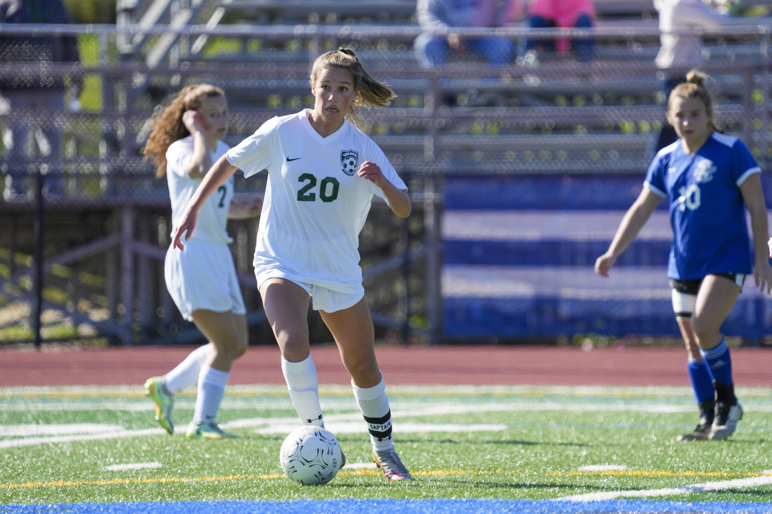 Westhampton Beach senior co-captain Amanda Shannon works the ball at midfield.    RON ESPOSITO
