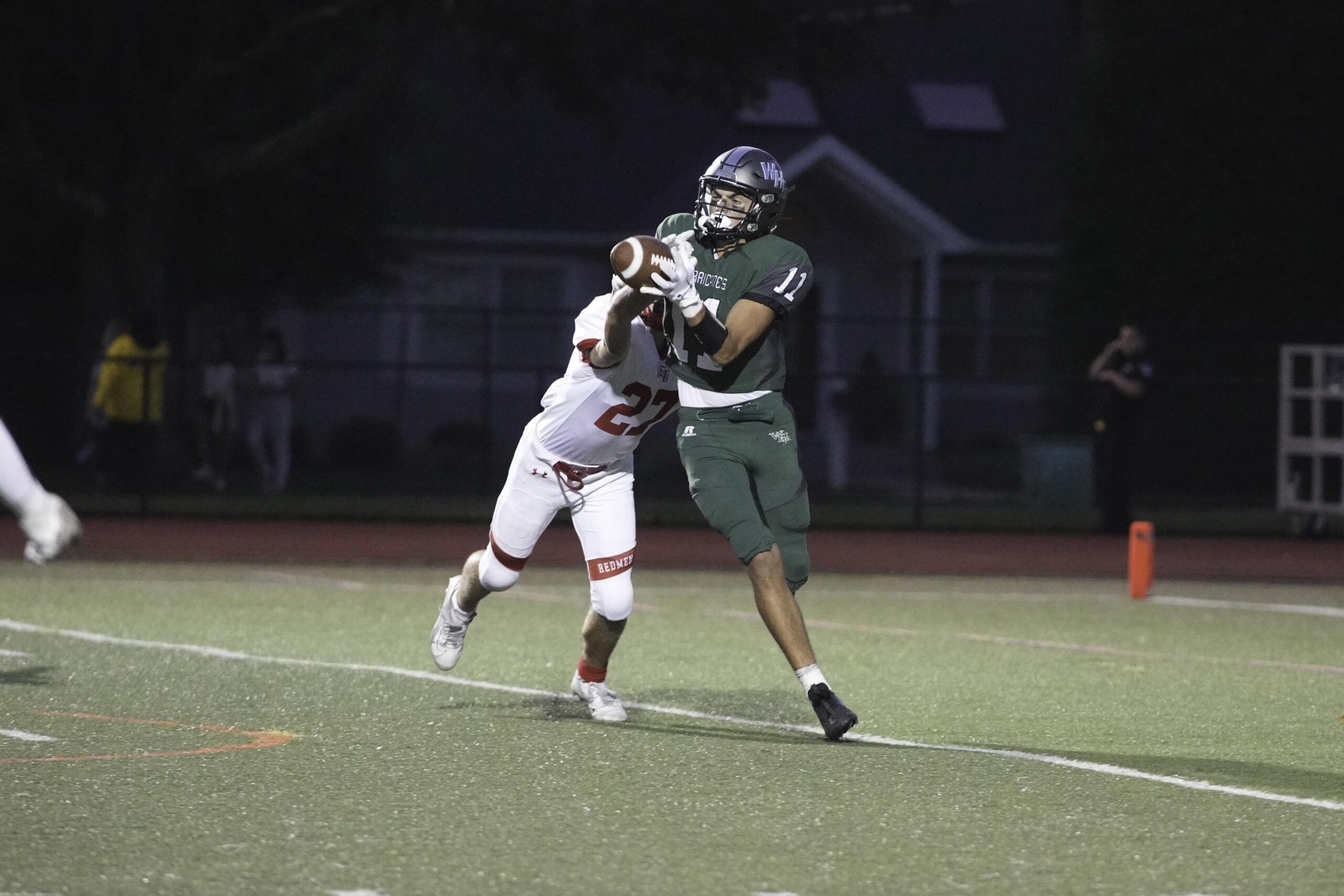 Westhampton Beach junior wide receiver Michael LoRusso hauls in a pass from quarterback Will Gambino.   RON ESPOSITO